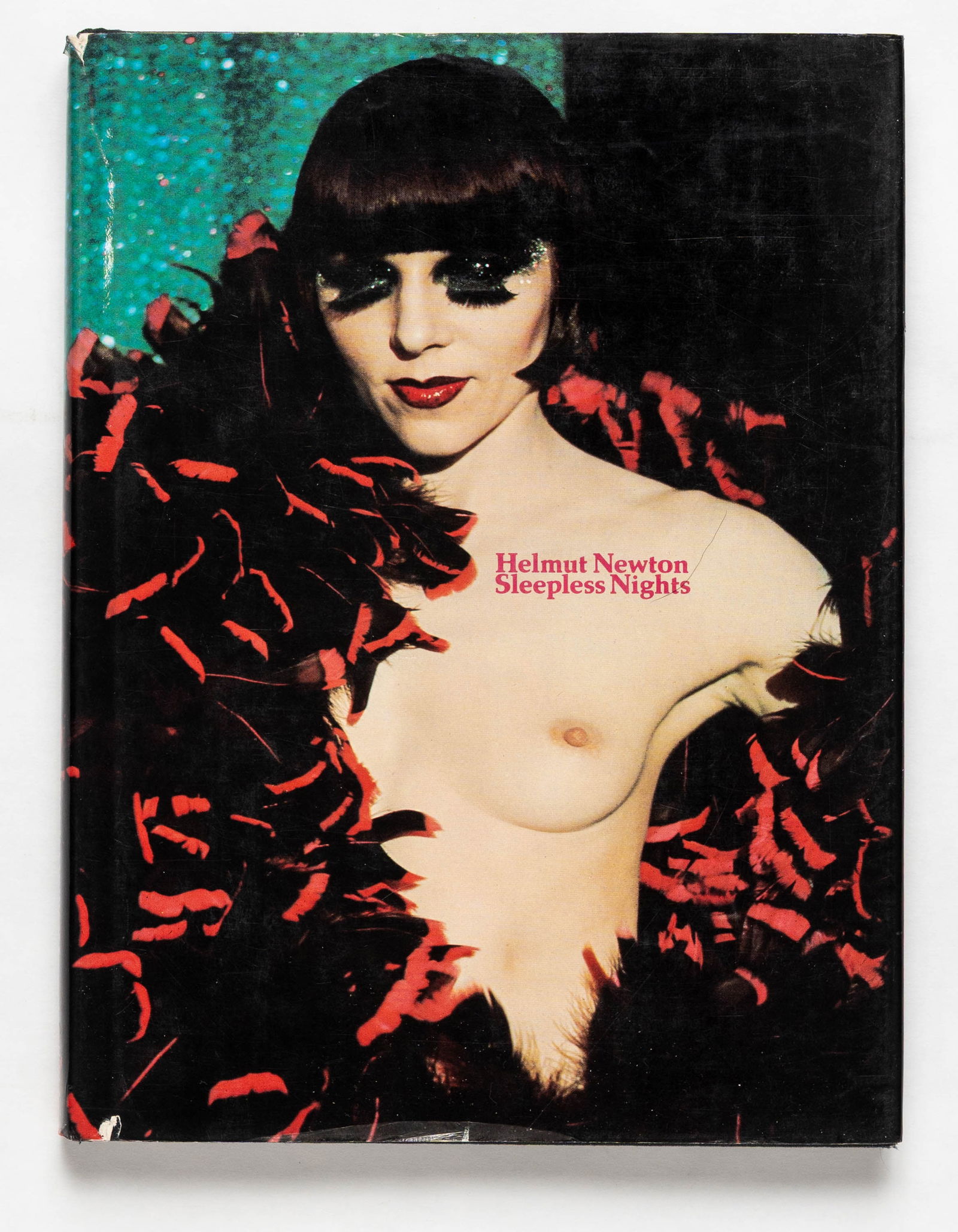 Helmut Newton, Sleepless Nights [1978 1ST EDITION 1ST PRINT]: Congreve Publishing, New York, 1978. Hardcover in pictorial dust jacket. First edition and first printing. Helmut Newton's second book. Photographs by Helmut Newton. Text by Edward Behr, European Edit