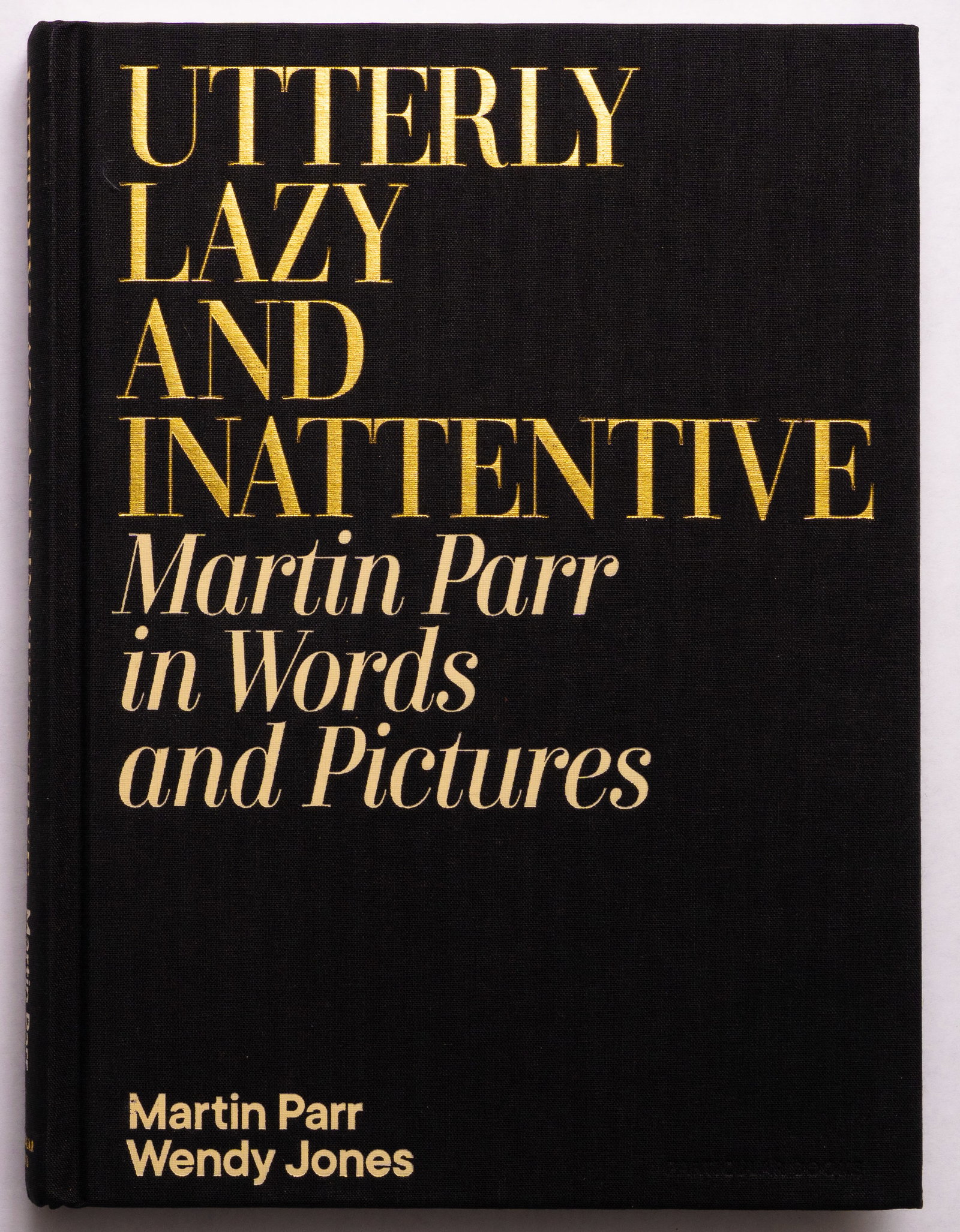 Martin Parr, Utterly Lazy and Inattentive [SIGNED 2025 1ST EDITION 1ST PRINTING]: SIGNED COPY London, Particular Books, 2025. Hardcover. First Edition, First Printing. 312 pages with numerous photographic images throughout by Martin Parr. This autobiography combines over 150 of Mar