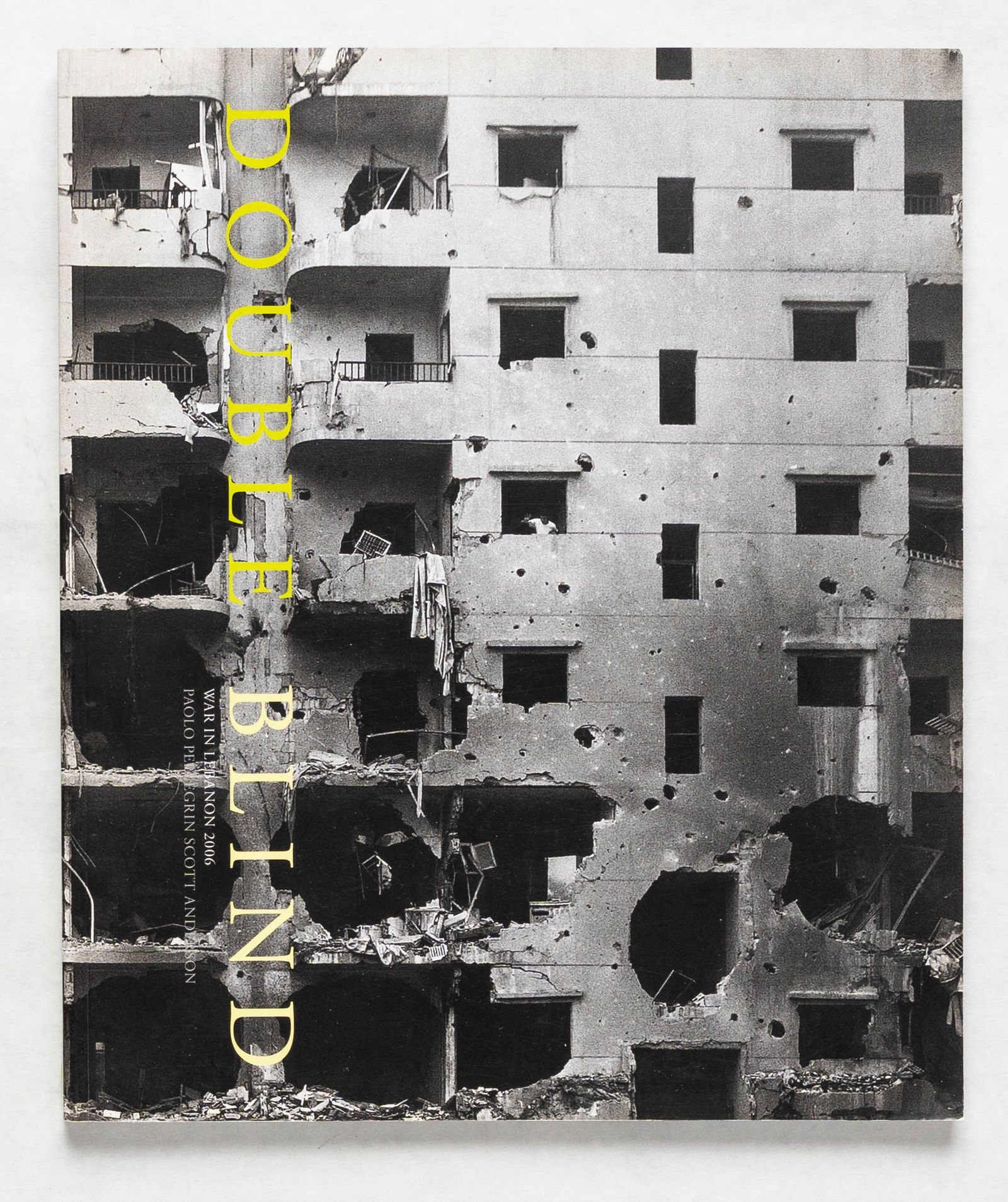 Pellegrin, Paolo; Anderson, Scott; Double Blind, War in Lebanon 2006 [SIGNED 1ST EDITION 1ST: London: Trolley Books, 2006. Softcover in pictorial wrappers. First Edition, First Printing (with full numberline ending in 1). 11 1/4 x 9 1/2 inches. 150 pages with numerous full-bleed photographic i
