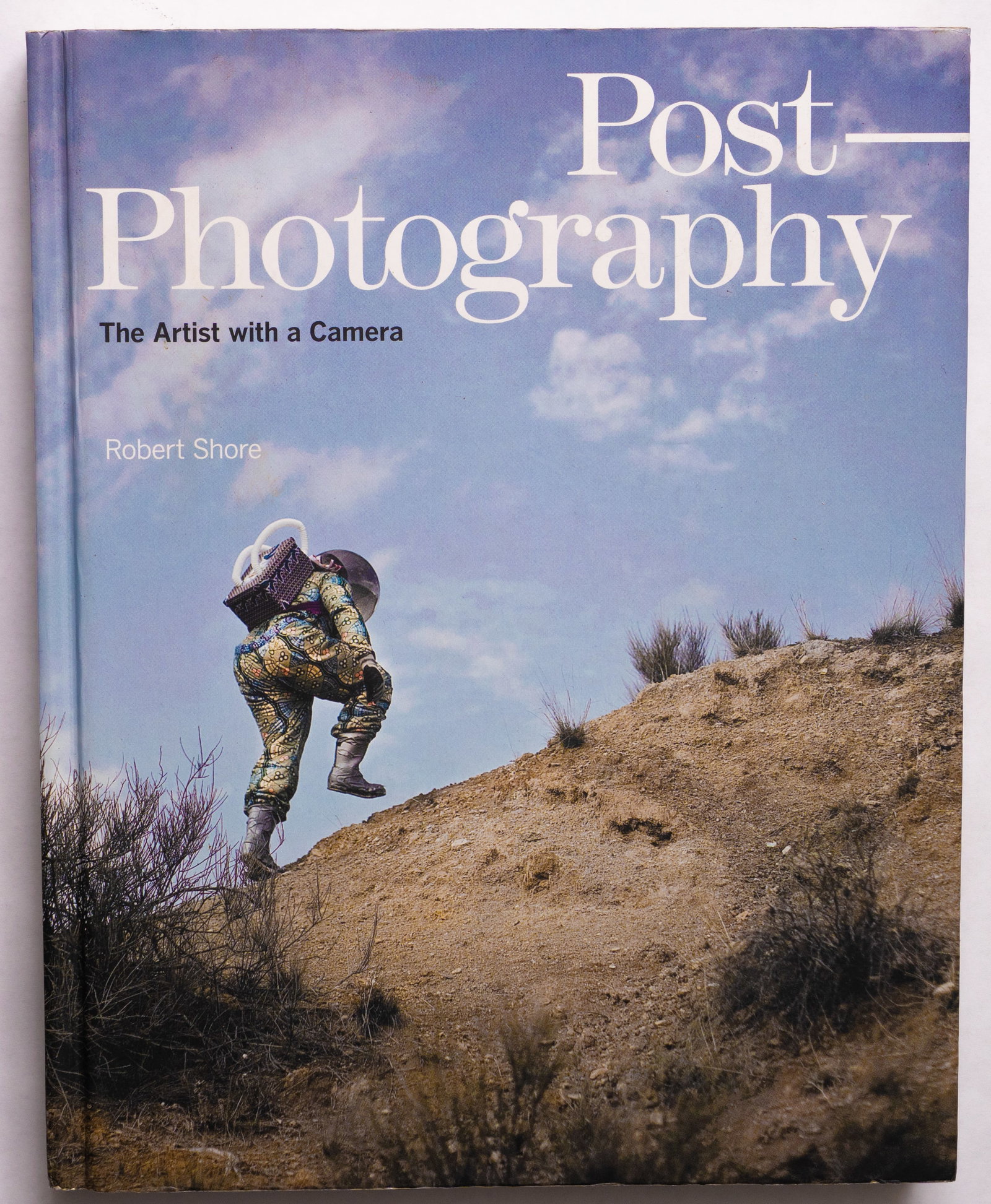 Shore, Robert; Post-Photography. The Artist With a Camera: Laurence King Publishing, 2014.. Hardcover in pictorial boards. First Edition, First Printing. 272 pages studying the role of the artist photographer in the virtual age with numerous color photographi