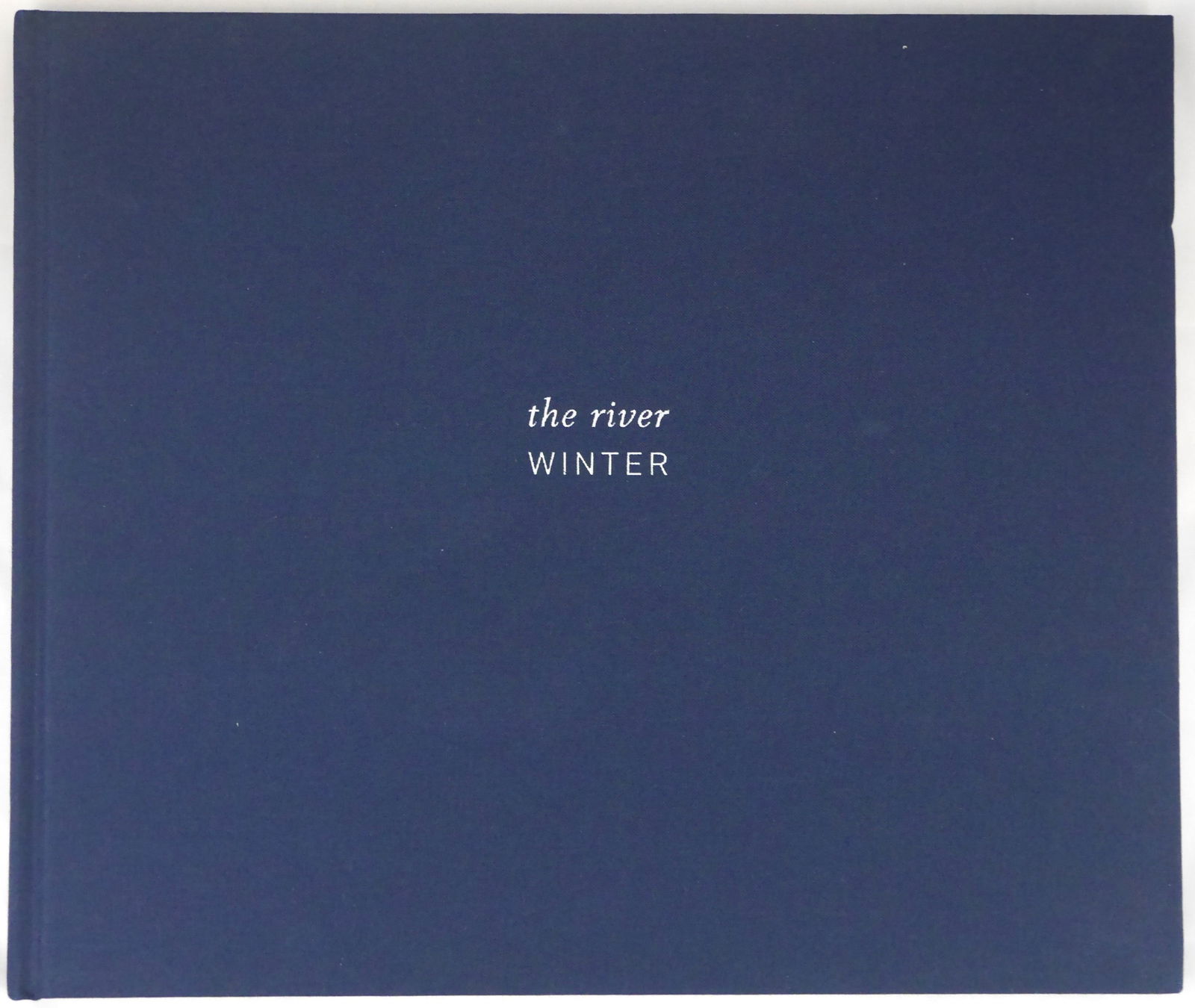 Southam, Jem; The River: Winter [2012 1ST EDITION]: Mack, 2012. Hardcover in navy blue cloth boards with title in white. First Edition, First Printing. Unpaginated with numerous color photographic images throughout. BOOK CONDITION: Fine; a solid, tight
