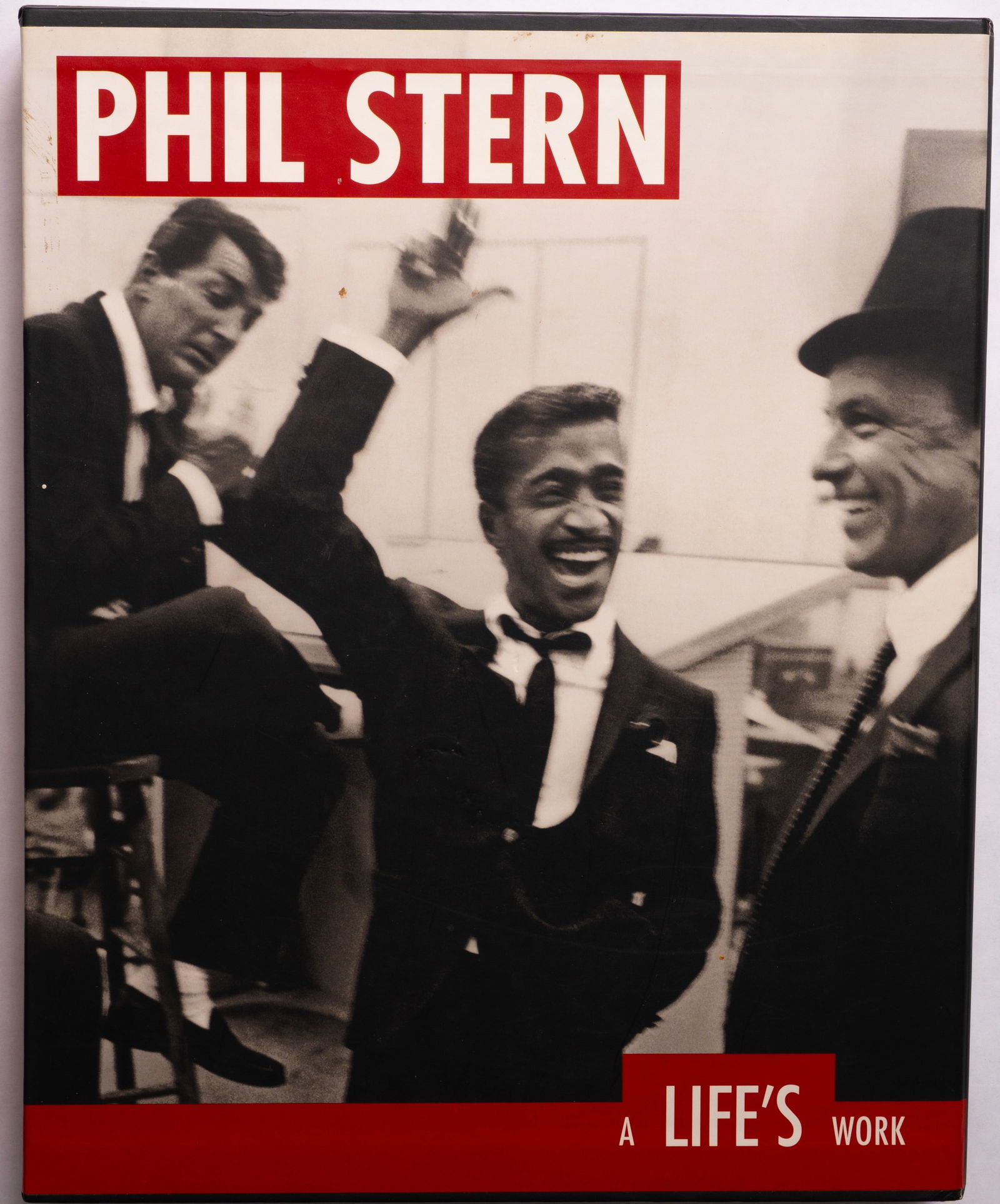 Phil Stern A Life's Work [SIGNED 2003 1ST EDITION IN SLIPCASE - FINE]: PowerHouse Books, New York. 2003. Hardcover in pictorial bards housed in pictorial cardboard slipcase. First edition, first printing. 14.5 x 11.75 inches. 253 pages filled with duotone and some full c