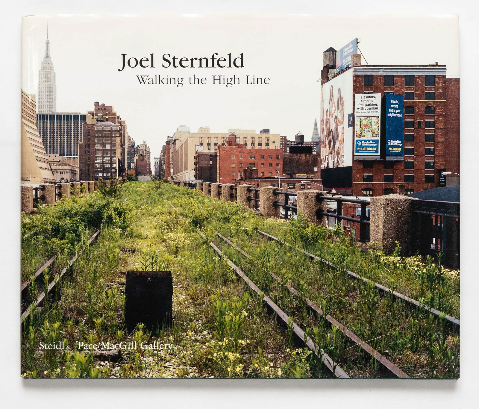 Sternfeld, Joel; Walking the High Line [SIGNED 2001 1ST EDITION 1ST PRINTING - FINE COPY]: SIGNED COPY - Steidl & Pace/MacGill Gallery, Gottingen, Germany & New York 2001. Hardcover in pictorial dust jacket. First Editioon, First Printing. 56 pages with 28 color and 5 b&w illustrations.BOOK