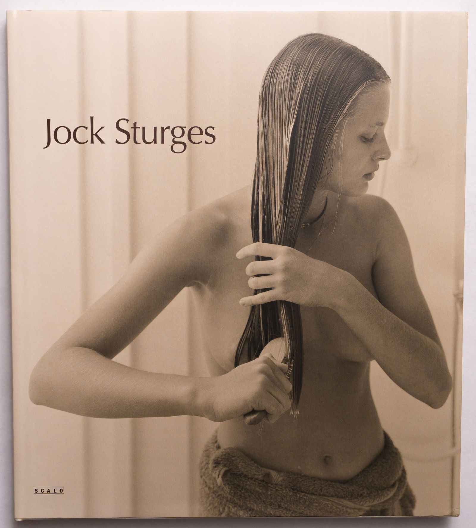 Jock Sturges, New Work 1996-2000 [SIGNED 2000 1ST EDITION 1ST PRINTING - FINE]: Scalo, Zurich, Berlin, New York. 2000. Hardcover in pictorial dust jacket. First english edition, first printing. 15 x 15 inches. 112 pages with 65 photographic plates in duotone and color. Text in