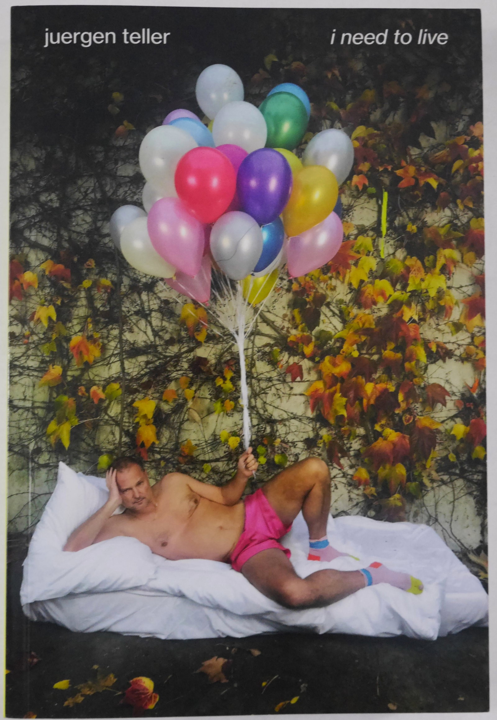 Teller, Juergen; I Need to Live [2023 1ST EDITION 1ST PRINTING - FINE]: Steidl, 2023. Softcover in pictorial wrappers. First Edition, First Printing. 8 x 5 inches. 376 pages with 700 photographic images in color throughout. BOOK CONDITION: Fine; a solid, tight, clean copy