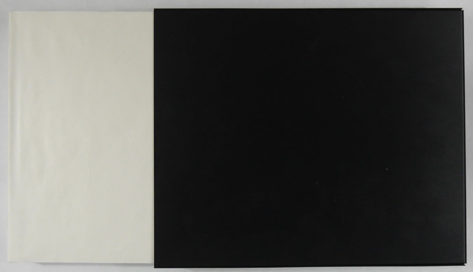 Sugimoto, Hiroshi; Snow White / Theaters [SIGNED LIMITED EDITION #/400 IN METAL SLIPCASE - FINE]: Damiani, 2017. Hardcover in thic white paper jacket housed in black metal slipcase as issued. First Edition limited to 400 individiually numbered and HAND-SIGNED copies. 160 pages with 76 beautifully 