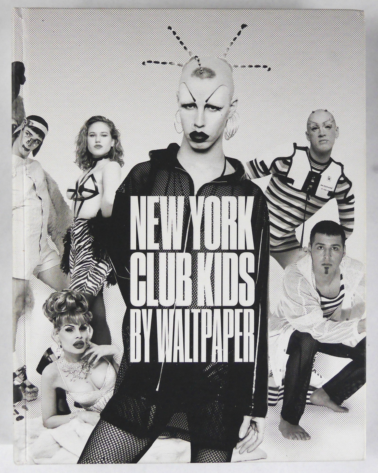Cassidy, Walt; New York Club Kids by Waltpaper [2019 1ST EDITION 1ST PRINTING - FINE]: Damiani, 2019. Hardcover in pictorial boards. First Edition, First Printing. 13 x 10 inches. 375 pages chock full of black and white and color photographs and illustrations, complimentary texts and es