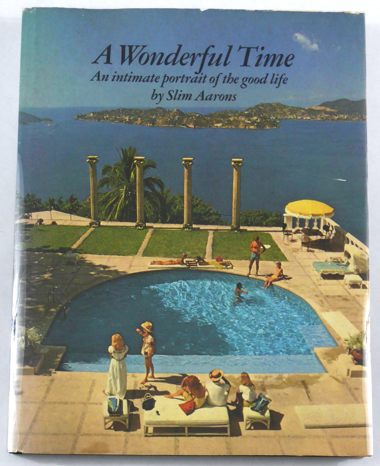 Aarons, Slim; A Wonderful Time [1974 1ST EDITION & 1ST PRINTING WITH DUST JACKET]: Harper & Row, New York 1974, Hardcover in pictorial dust jacket. First edition, First Printing. Folio. 213 pages with numerous color and black and white photographic images throughout showcasing Aaron