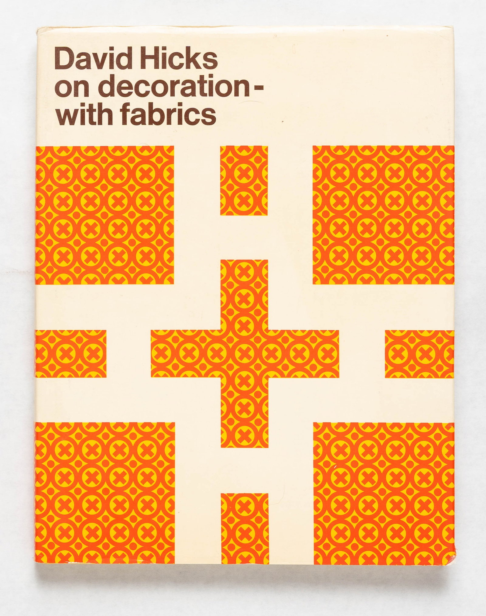 David Hicks. On Decoration with Fabrics [1971 1ST EDITION - FINE]: World Publishing, 1971. Hardcover in pictorial dust jacket. First American edition, stated. 4to. 9.5 x 12.25 inches. Approximately 200 pages profusely illustrated throughout in color and black-and-whi