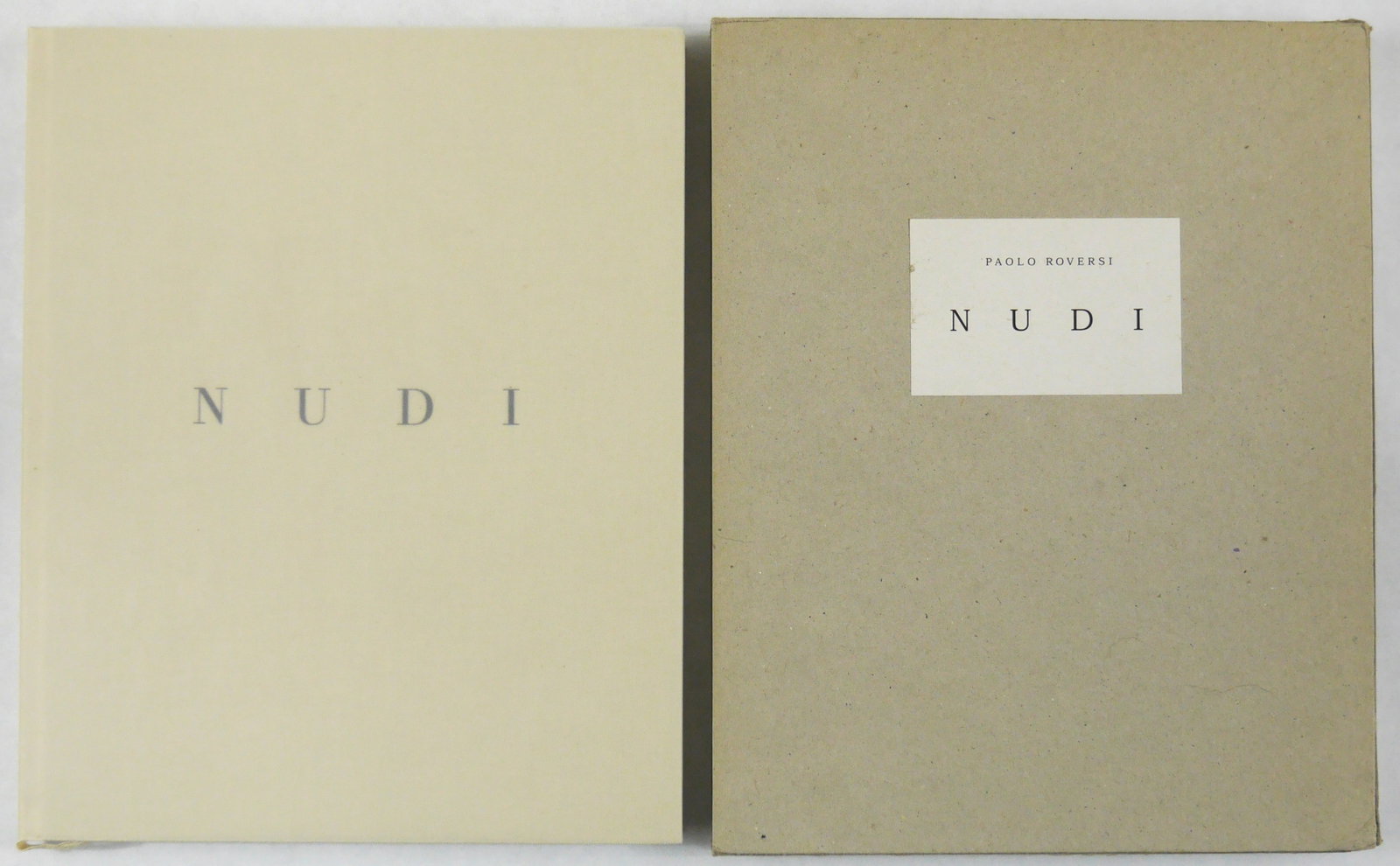 Roversi, Paolo; Nudi [1999 1ST EDITION & 1ST PRINTING IN SLIPCASE]: Stromboli, Paris, 1999. Cloth. First Edition in vellum dust jacket in cardboard slipcase. 4to - over 9?" - 12" tall. 102 pages with 46 photographs. BOOK CONDITION: Fine; a tight, clean, unmarked copy 