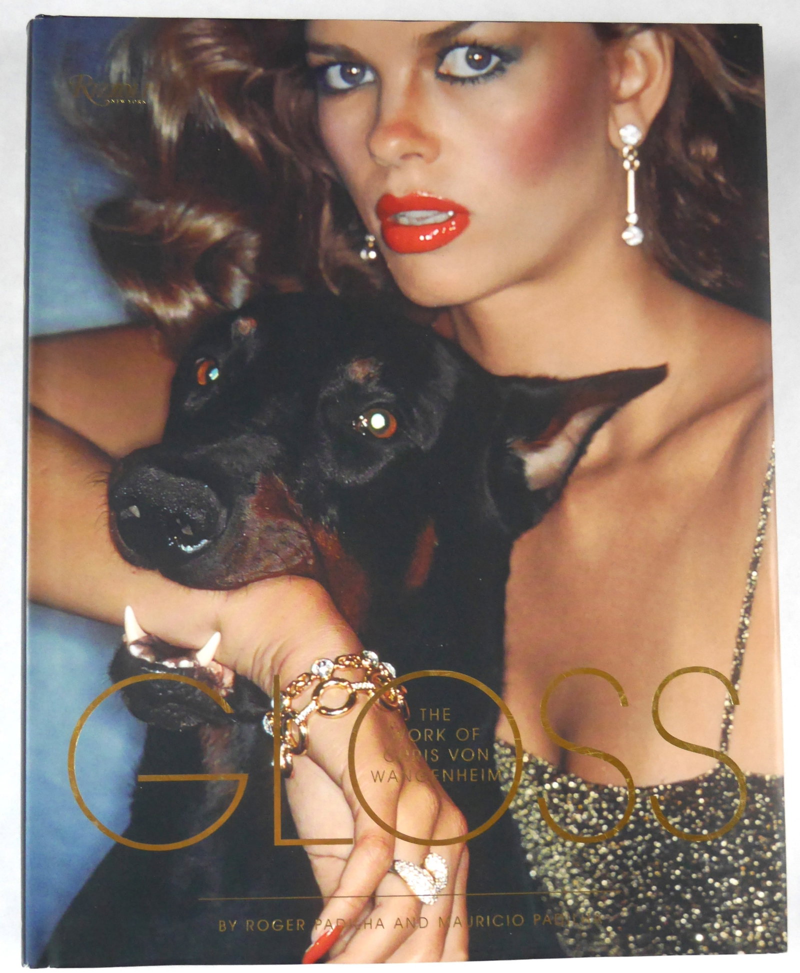 Gloss, The Work of Chris Von Wangenheim [2015 1ST EDITION 1ST PRINTING - FINE]: Rizzoli, 2015. Hardcover in pictorial dust jacket. First Edition, First Printing. 13 x 11 inches. 280 pages with 215 color photographic images by Chris Von Wangenheim throughout offering an exhilerati