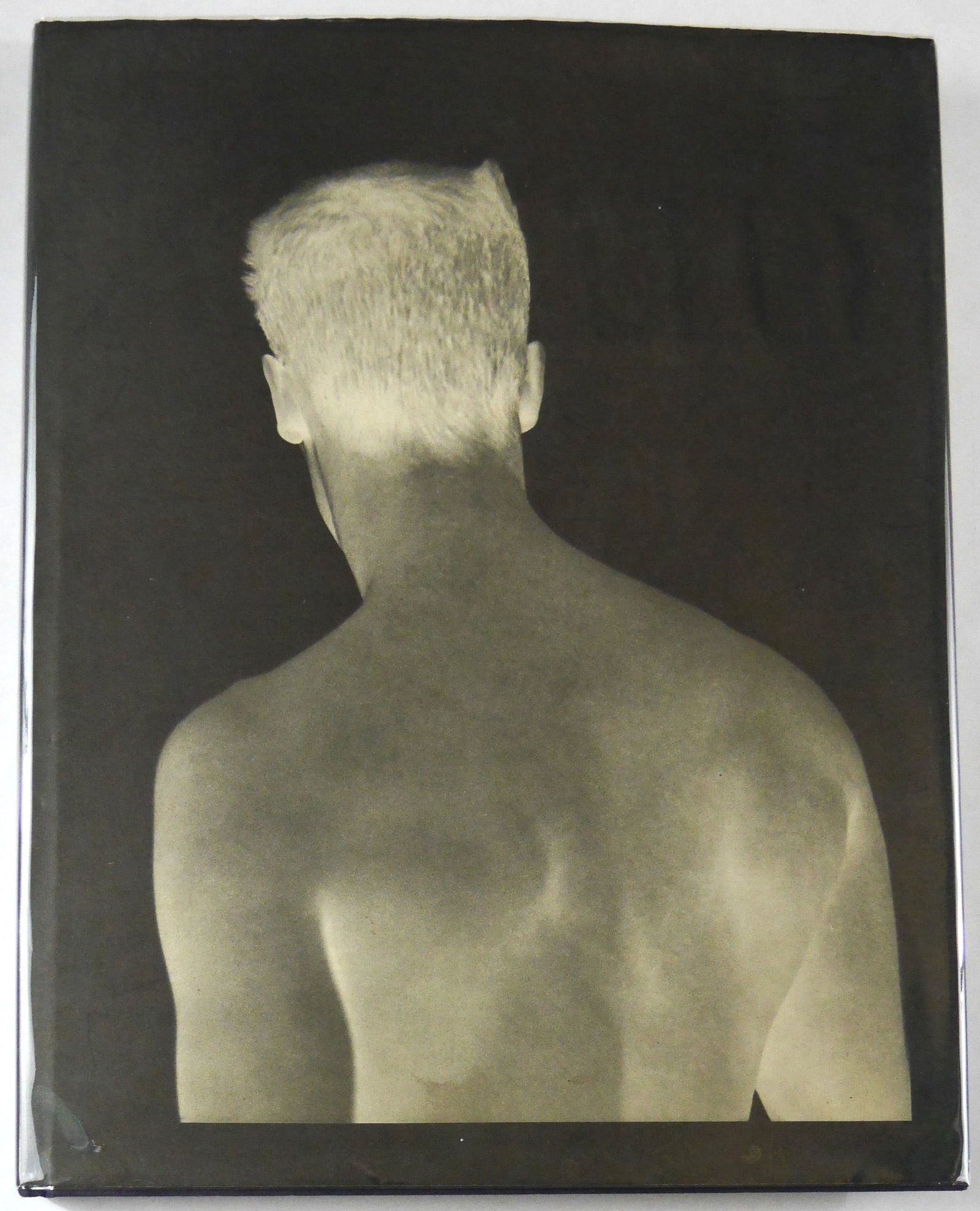 Bruce Weber [1983 TWELVETREES PRESS MONOGRAPH - STATED FIRST EDITION - FINE COPY]: Los Angeles, CA: Twelvetrees Press, 1983.Hardcover in pictorial dust jacket. First Edition of 5000 copies (stated). 14.5 x 11.5 inches. 156 pages with 76 black and white photographic images showcasing