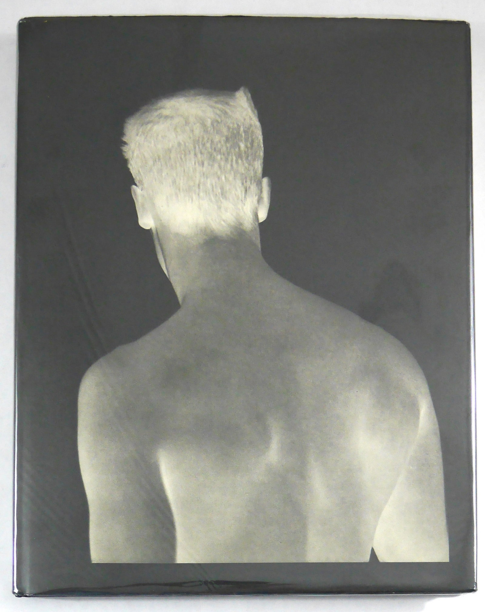 Bruce Weber [SIGNED - 1983 TWELVETREES PRESS MONOGRAPH - STATED FIRST EDITION - FINE COPY]: SIGNED COPY - Los Angeles, CA: Twelvetrees Press, 1983.Hardcover in pictorial dust jacket. First Edition of 5000 copies (stated). 14.5 x 11.5 inches. 156 pages with 76 black and white photographic ima