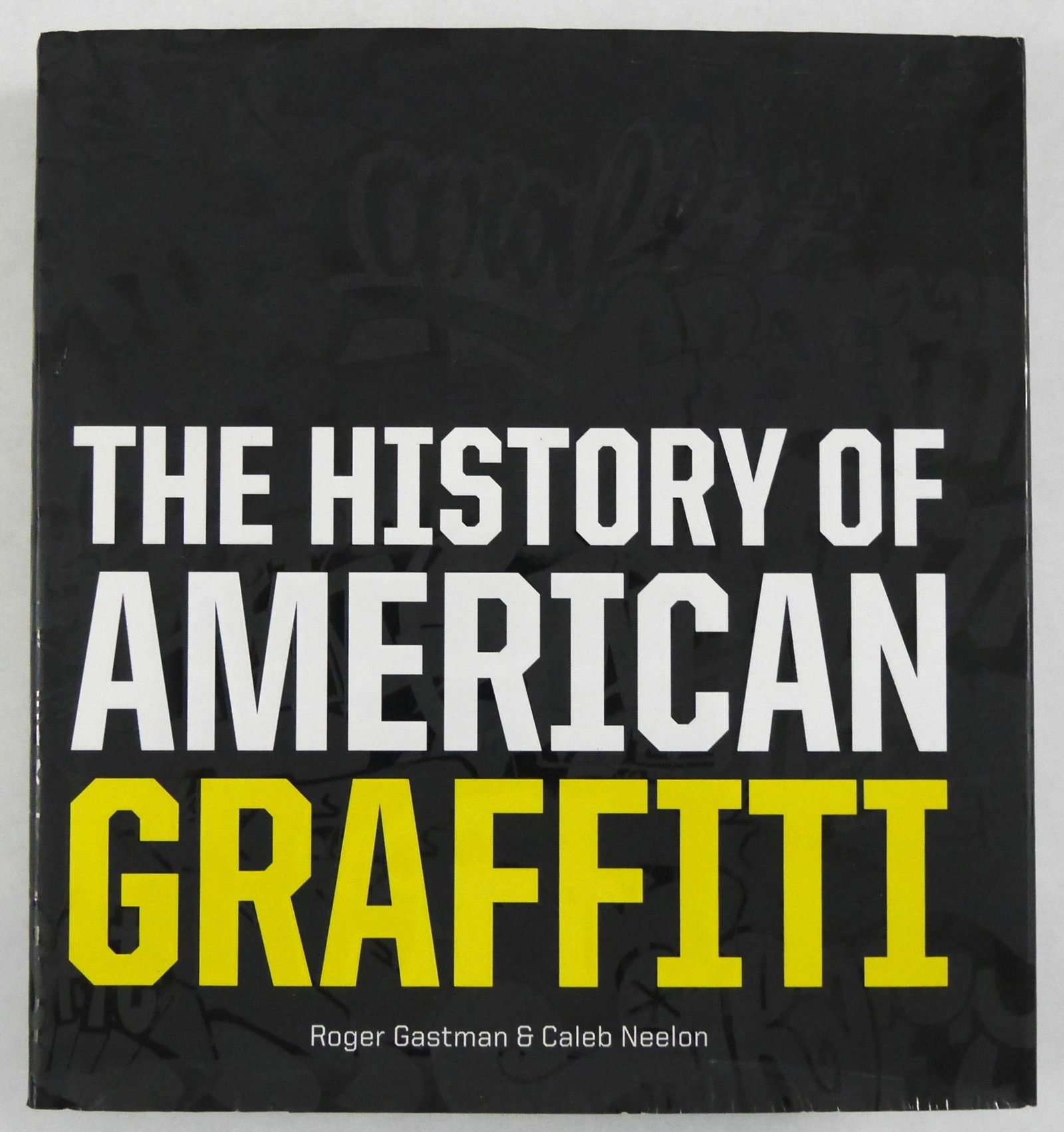 Gastman, Roger; The History of American Graffiti [SIGNED 2011 1ST EDITION - FINE]: SIGNED COPY - Harper Design, 2011. Hardcover in black printed dust jacket. First Edition, First Printing (stated). 10 x 10 inches. 408 pages with numerous illustrations and photographic images through
