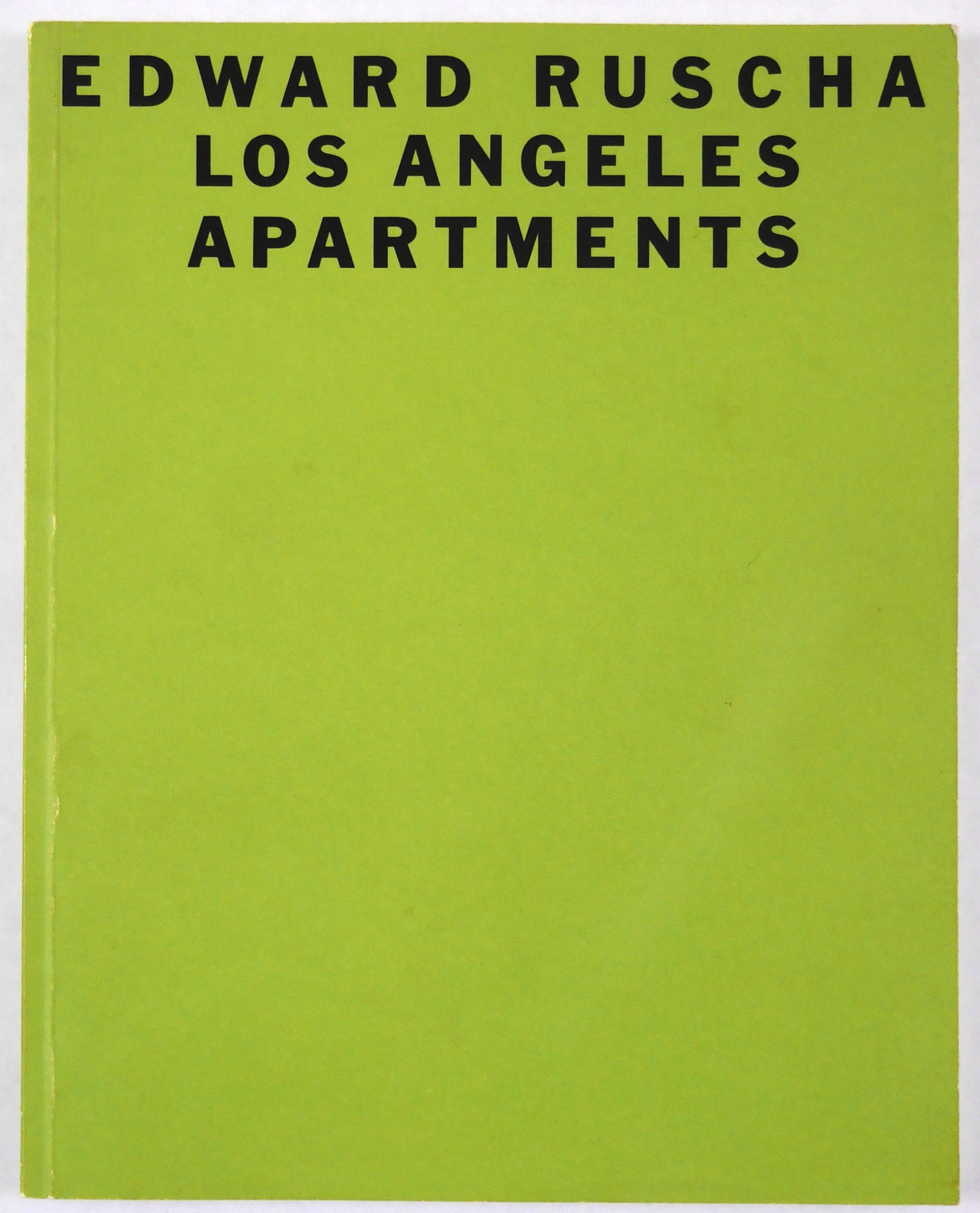 Edward Ruscha Los Angeles Apartments 1965 [SIGNED 1990 1ST EDITION]: SIGNED COPY - Whitney Museum of American Art, 1990.? Softcover in printed green wraps. First Edition. 4to. UNpaginated with circa 80 pages.?Published on the occasion of Ruscha's 1990 exhibition at the