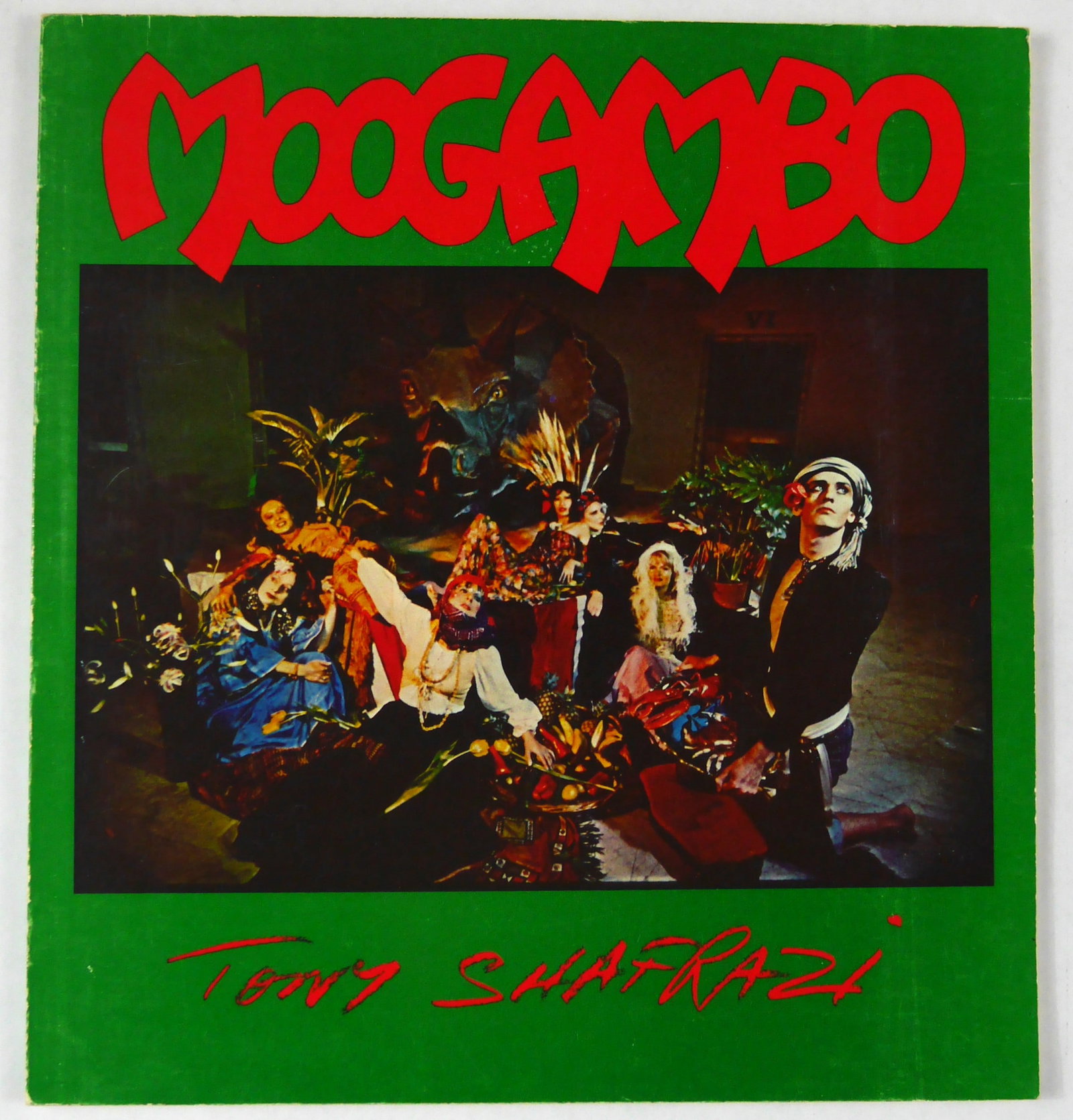 Tony Shafrazi, Moogambo [RARE 1976 1ST LIMITED EDITION]: Tony Shafrazi, 1976. Softcover in pictorial wrappers. First Edition. Limited Edition of only 1000 copies. 10 x 10 inches. Unpaginate with approximately 56 pages with circa 50 photographic images in co