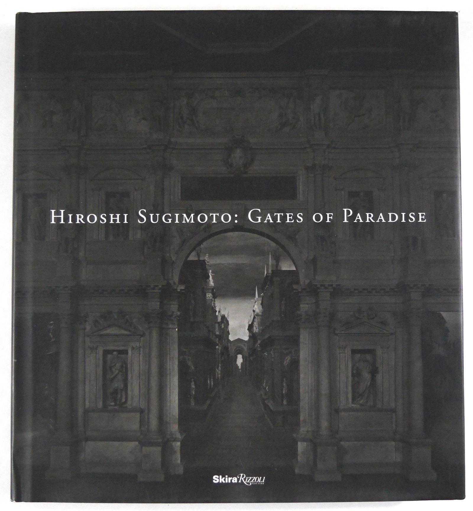 Hiroshi Sugimoto, Gates of Paradise [SIGNED 2017 1ST EDITION - FINE]: SIGNED COPY - Skira/Rizzoli, 2017. Hardcover in pictorial dust jacket. First Edition, First Printing. 12 x 11 inches. 216 pages with numerous black and white and color illustrations throughout. Accomp