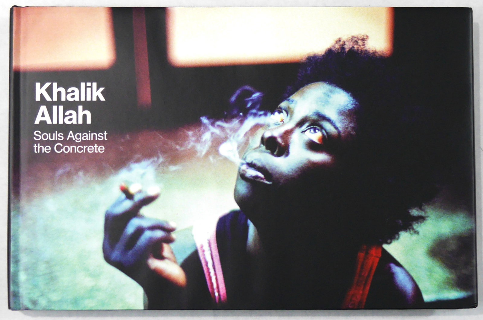 Allah, Khalik; Souls Against the Concrete [2017 1ST EDITION 1ST PRINTING - FINE]: Univ of Texas Pr, 2017. Hardcover in pictorial dust jacket. First Edition, First Printing. 8 x 12 inches. 208 pages with numrous full-bleed color phootographic images throughout.?Since 2012, Allah has