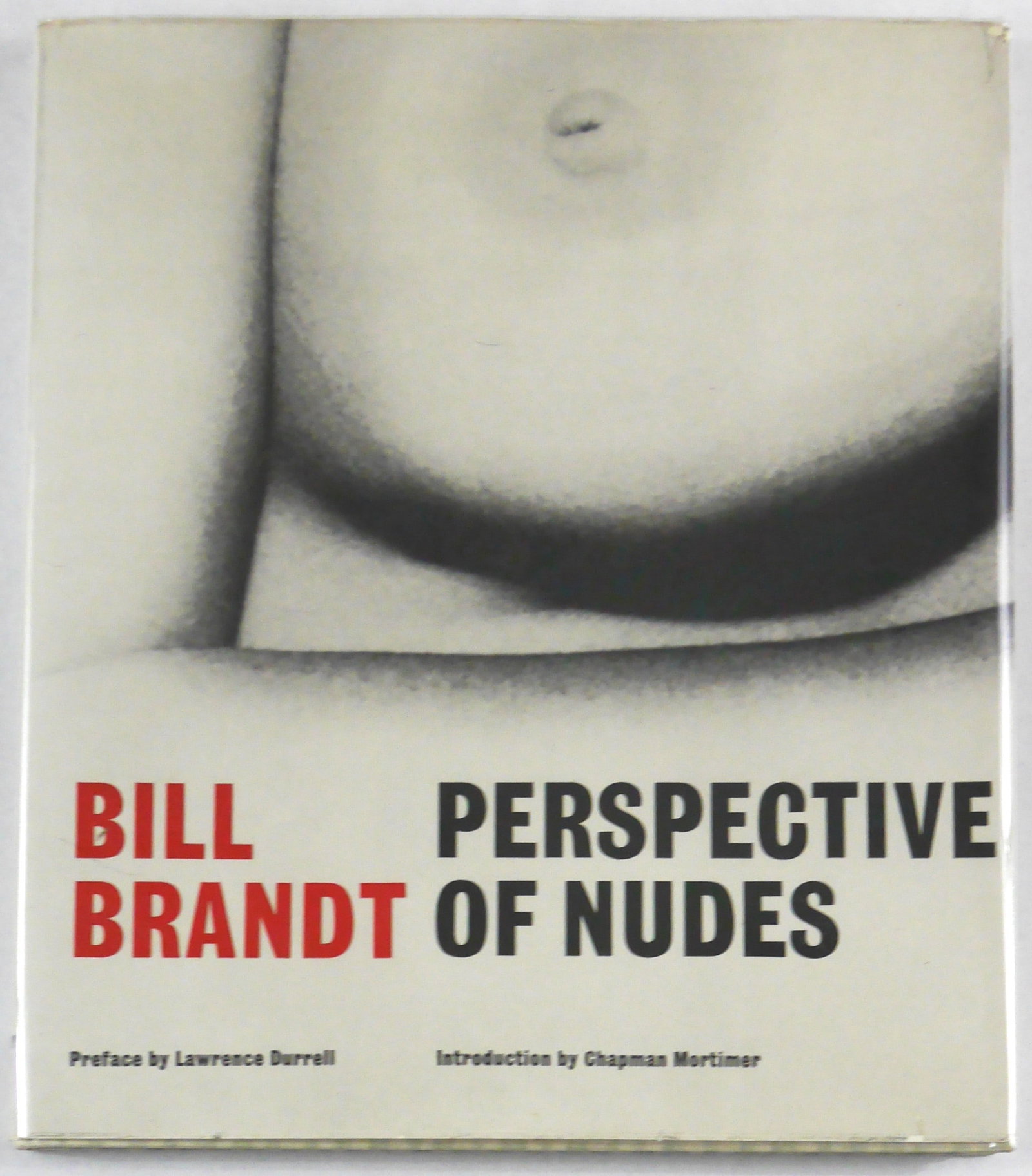 Brandt, Bill; Perspective of Nudes [1966 1ST EDITION & 1ST PRINTING - FINE COPY]: The Bodley Head, London, 1961. Hardcover in pictorial dust jacket. First Edition, First Printing. 11 x 9.5 in. (28 x 24 cm). 14 pp. text + 90 gravure reproductions by Bill Brandt printed in Switzerlan