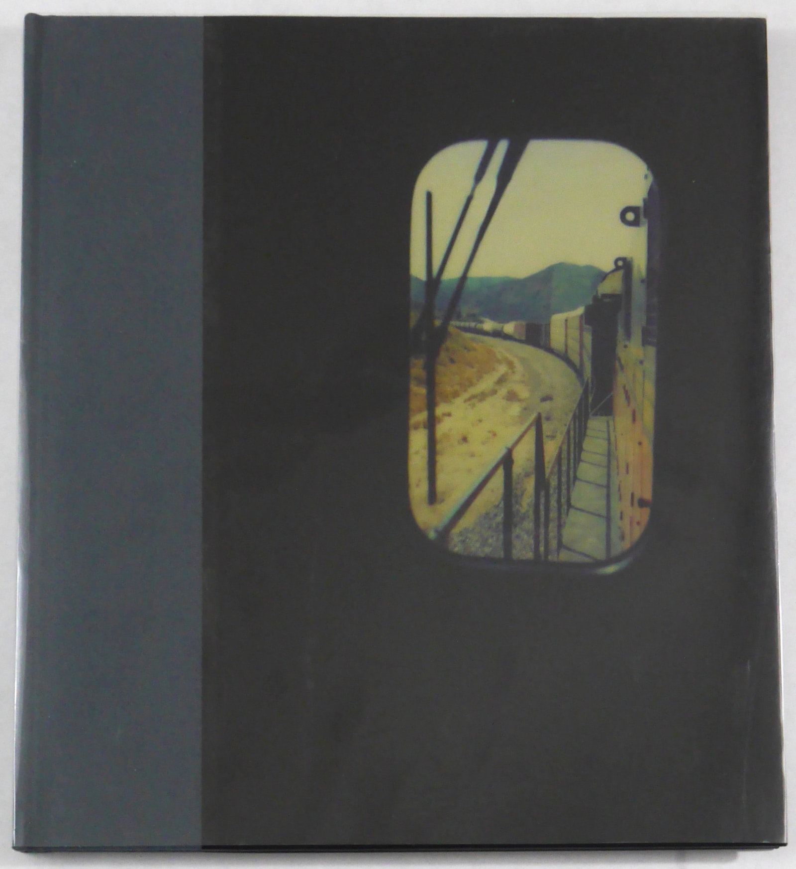 Brodie, Mike; Tones of Dirt and Bone [SIGNED 2015 1ST EDITION - FINE]: SIGNED COPY Twin Palms, 2015. Hardcover in pictorial boards. with clear acetate dist jacket. First Edition. 10 x 11 inches. 88 pages with 50 four-color photographic images. SIGNED by Mike Brodie on th