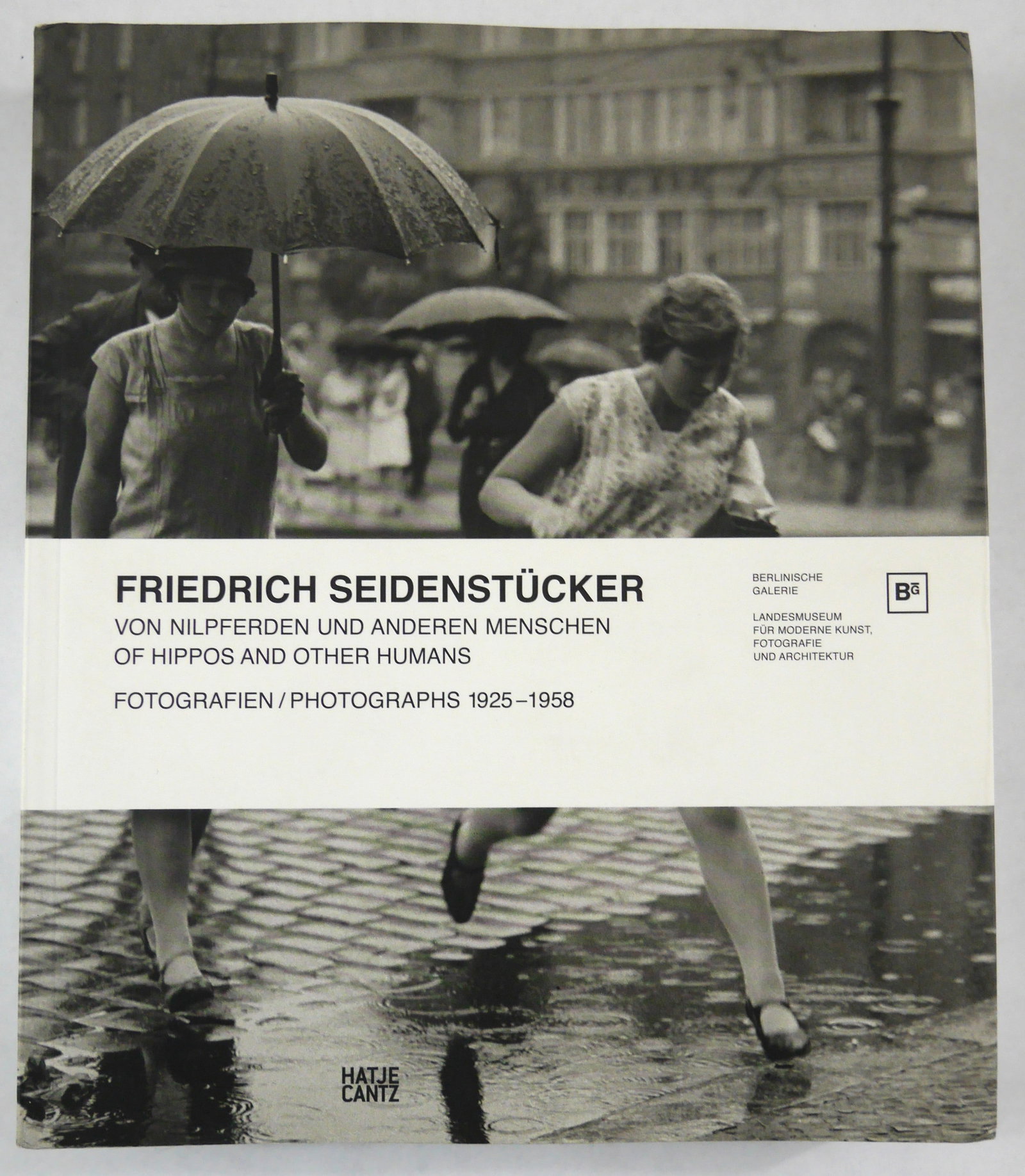 Friedrich Seidenst?cker. Hippos and other Humunas. Photographs 1925-1958 (Weimar Germany).: Hatje Cantz, 2012. Softcover in pictorial dust jacket. First Edition.? 328 pages with 299 photographic images throughout with accompanying texts in German (with English translations at the rear). Phot