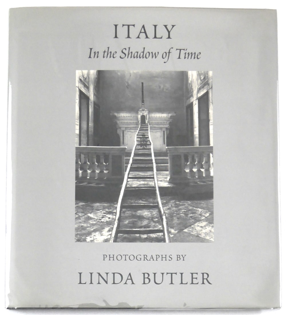 Butler, Linda; Italy In the Shadow of Time [SIGNED ASSOCIATION COPY - FINE]: Unpaginated with 60 black and white photographs followed by "Notes to the Photographs" and preceded by a forward by Naomi Rosenblum and the artist's essay.? SIGNED/INSCRIBED to fellow photographer Lyn