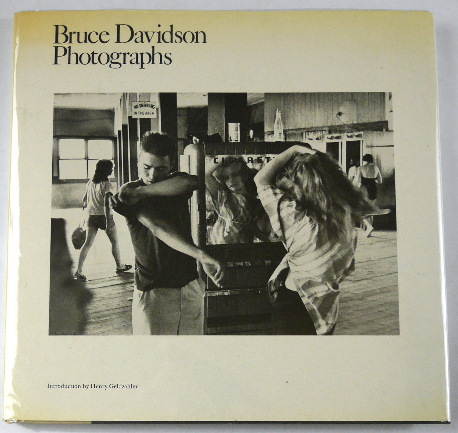 Bruce Davidson, Photographs [SIGNED 1978 1ST EDITION HARDCOVER - FINE]: SIGNED COPY - Agrinde/Summit, 1978. Hardcover in pictorial dust jacket. First Edition, First Printing. 12 x 14 inches. 165 pages with numerous black and white photographic images throughout including 