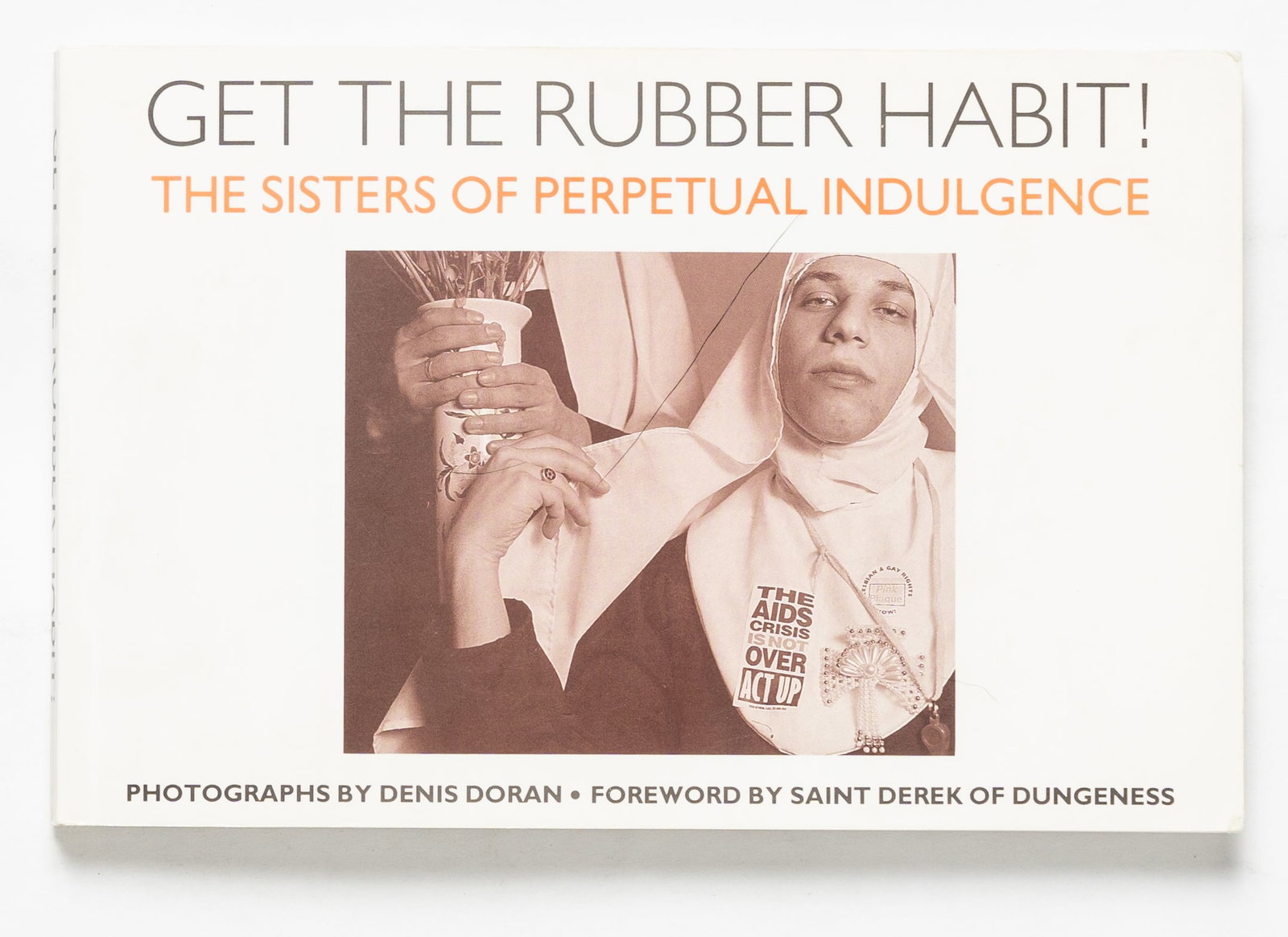 Doran, Dennis; Get the Rubber Habit! The Sisters of Perpetual Indulgence [RARE 1994 SAFE-SEX: Blase Ltd, 1994. Softcover with pictorial wrappers. First Edition, First Printing. 32 bound-in postcards, each with a staged, ironic, tongue-in-cheek black and white photographic image featuring men d
