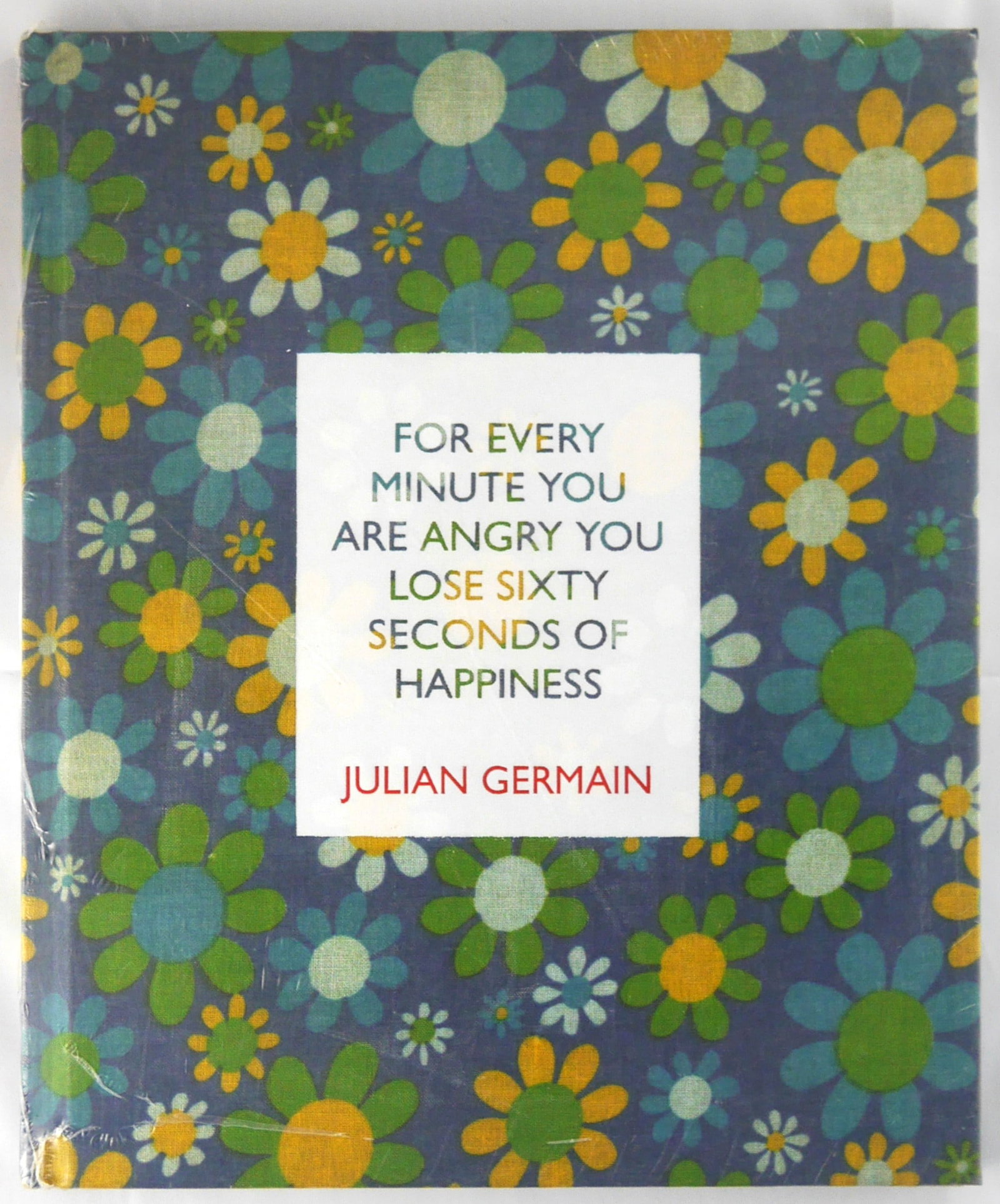 Germaine, Julian; Every Minute You Are Angry You Lose 60 Seconds of Happiness [2005 1ST ED 1ST PRINT: Steidl, 2005. Hardcover. First Edition, First Printing. 72 pages with 40 color plates. 11 x 9". Book Condition: New/Fine (still sealed in publisher's shrinkwrap).