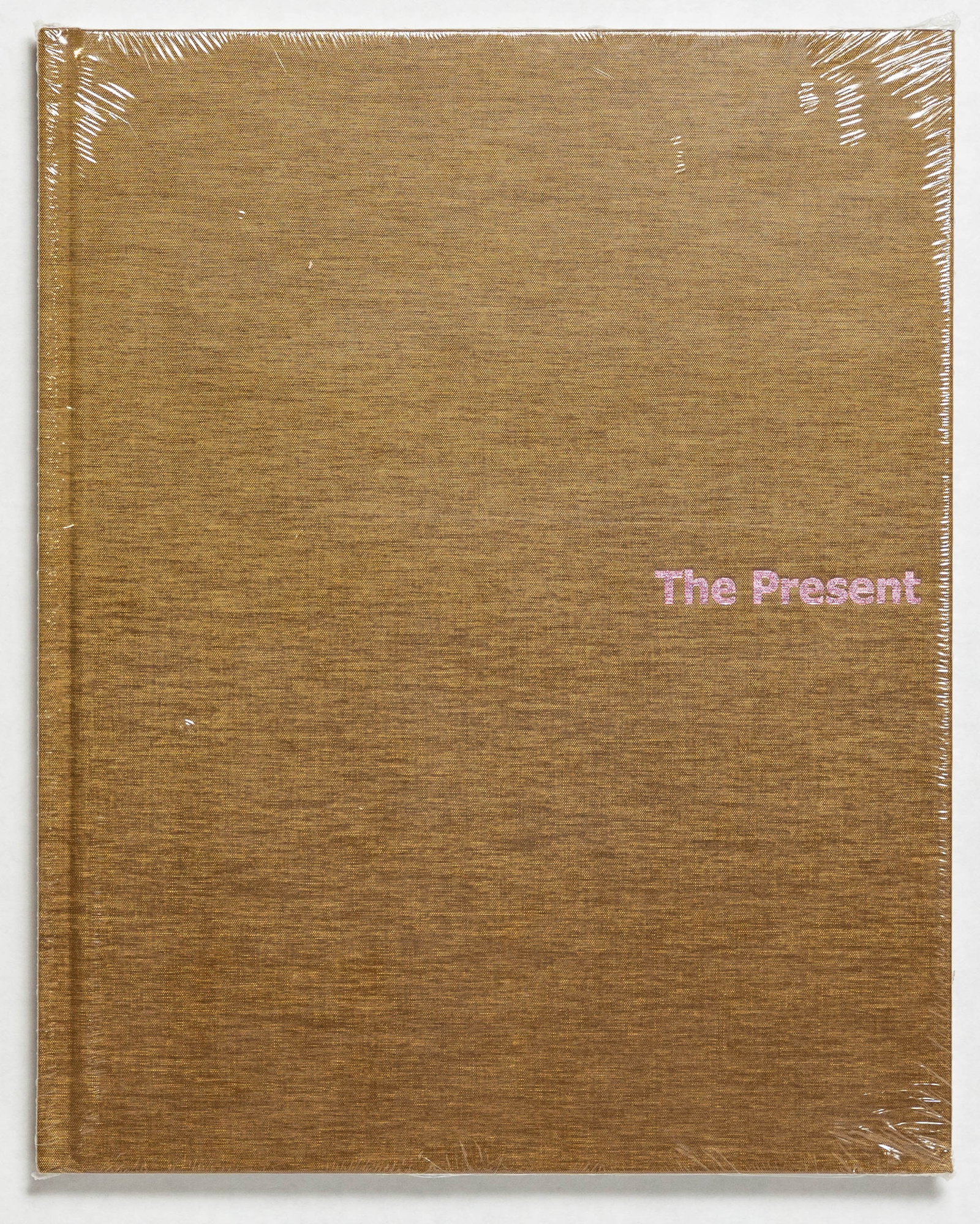 Graham, Paul; The Present [2012 1ST EDITION - SHRINKWRAPPED COPY]: Mack, 2012. Hardcover. First Edition, First Printing. Limited to 100 copies. 9" x 12". 114 pages with numerous color photographic images throughout by Paul Graham (including 13 gatefolds). Book Condit