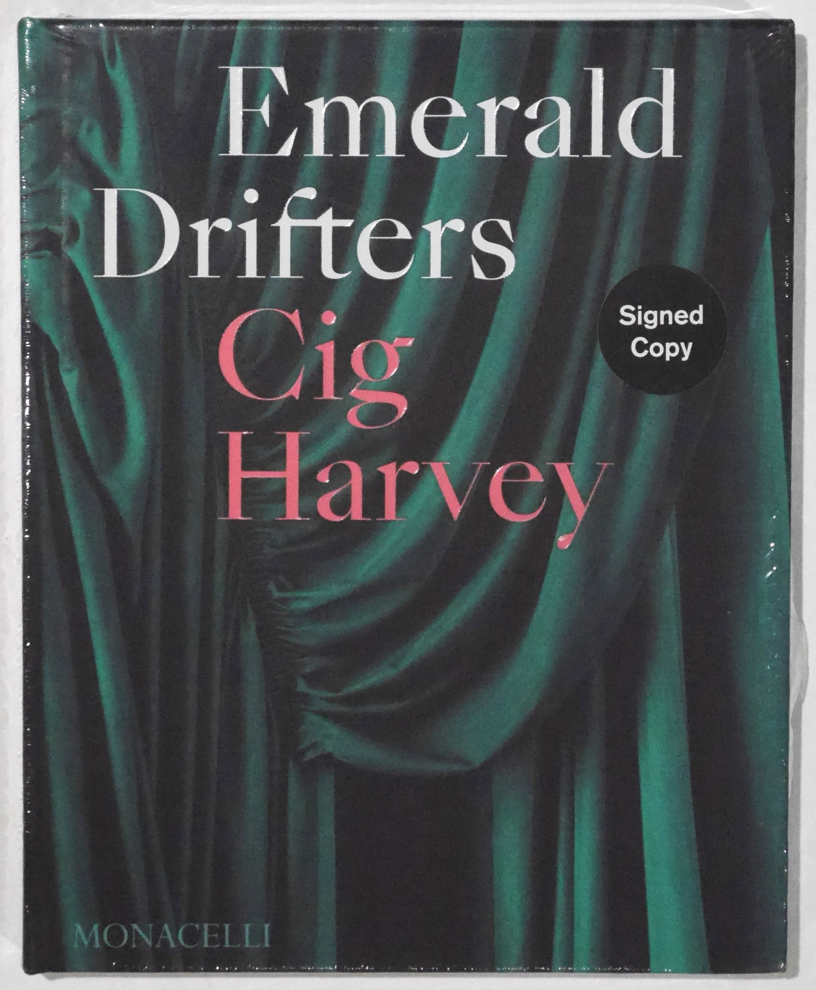 Cig Harvey, Emerald Drifters [SIGNED 2025 PHAIDON 1ST EDITION - FINE: SIGNED COPY - Monacelli Press, 2025. Hardcover in illustrated boards. First Edition, First Printing. 224 pages with 100 photographic images throughout by photographer and writer Cig Harvey offering a 