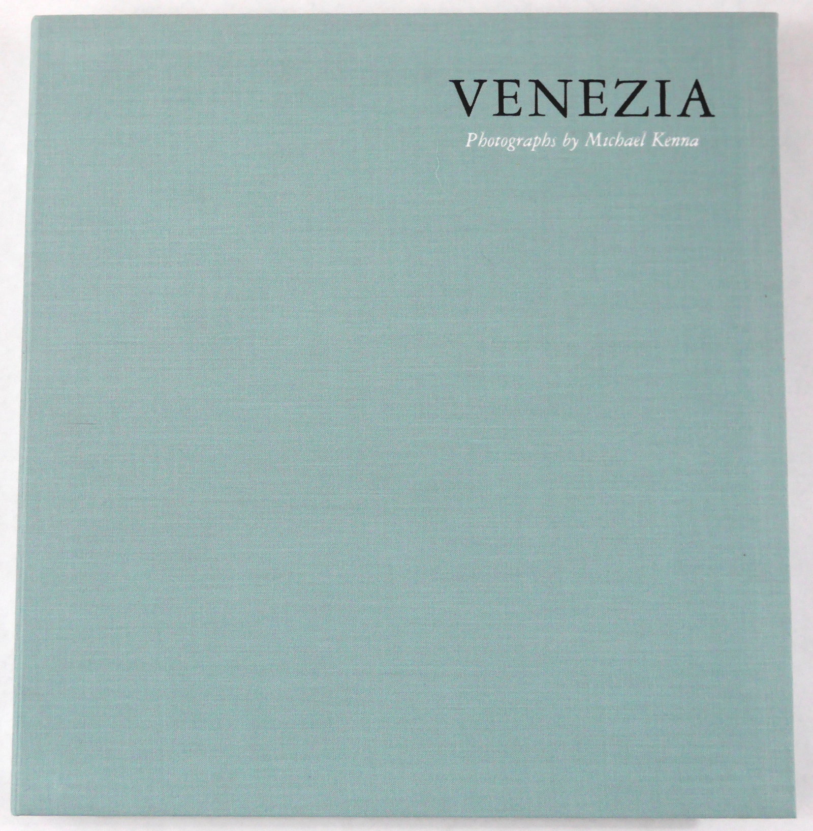 Kenna, Michael; Venezia [SIGNED - 2010 LIMITED EDITION #/250 IN CLAMSHELL CASE]: Nazraeli Press, Portland, OR, 2010. Hardcover in pictorial dust jacket housed in sky-blue cloth slipcase. First edition. First printing. Limited SIGNED edition LIMITED TO 250 individually numbered cop