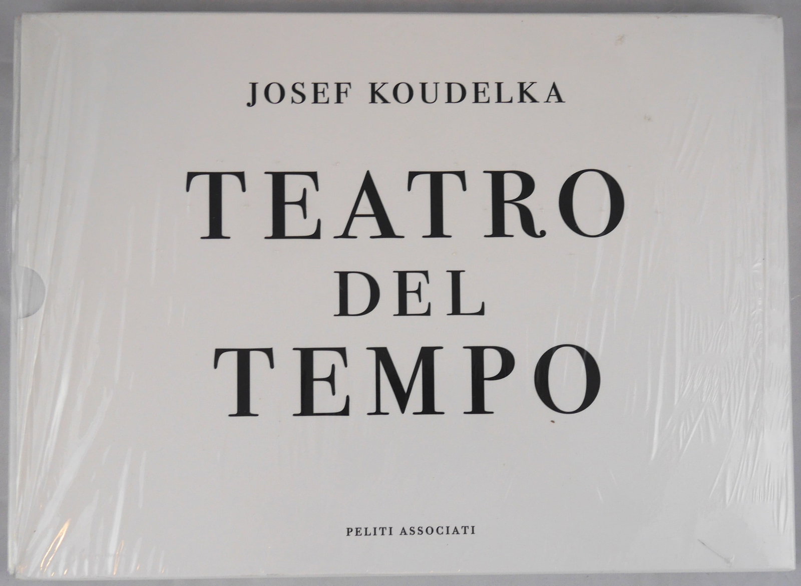 Koudelka, Josef; Teatro del Tempo [SIGNED 2003 1ST EDITION IN SLIPCASE]: Peliti. 2003 Hardcover accordion fold in card slipcase. First Edition, First Printing. Italian Editon. 56 pages; 25 double-page b&w photographic plates showing magnificent and exquisitely-printed pano