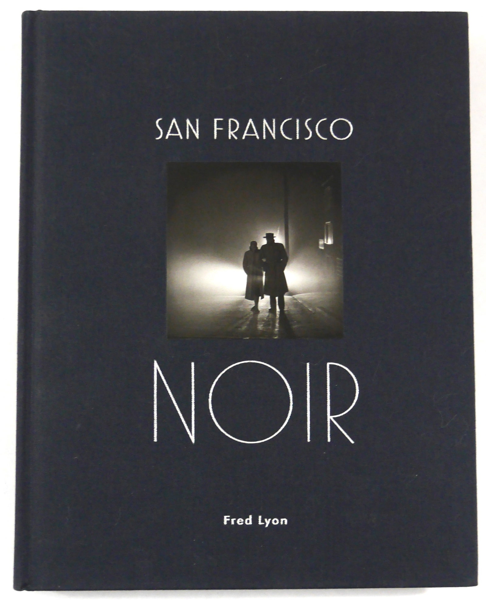 Lyon. Fred; San Francisco Noir [2018 1ST EDITION 1ST PRINTING]: Princeton Architectural Press, 2018. Black cloth hardcover with the paper band still on the back board, image tipped to the front board with silver letters, First Edition (stsated), First Printing (wi