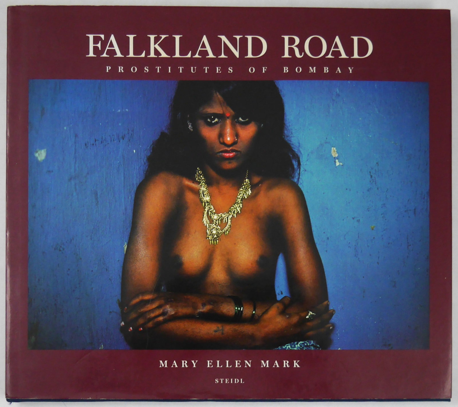 Mark. Mary Ellen; Falkland Road [SIGNED - 2005 STEIDL HARDCOVER]: SIGNED COPY Steidl, 2005. Hardcover in pictorial dust jacket. Second Edition. Quarto. SIGNED by Mary Ellen Mark. Her landmark study of the prostitutes of Bombay. Citedd in The Open Book pages 324-325.