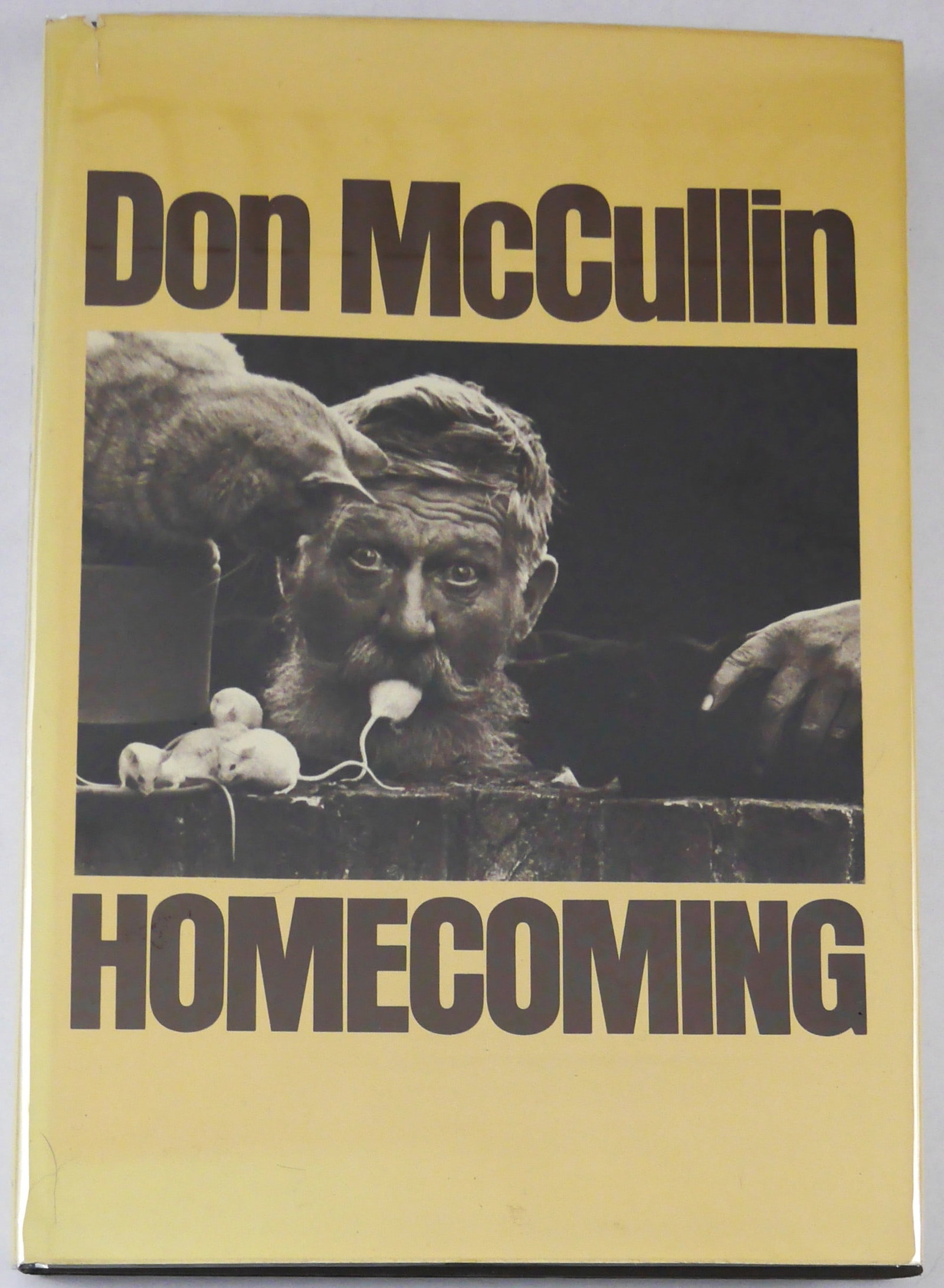 Don McCullin, Homecoming [SIGNED 1979 1ST EDITION HARDCOVER]: St. Martin's Press Inc, New York, 1979. First U.S. edition. Hardcover. First printing. 9.5 x 13.5 inches.190 pages; full-spread b&w plates throughout; offering a powerful collection of black and white