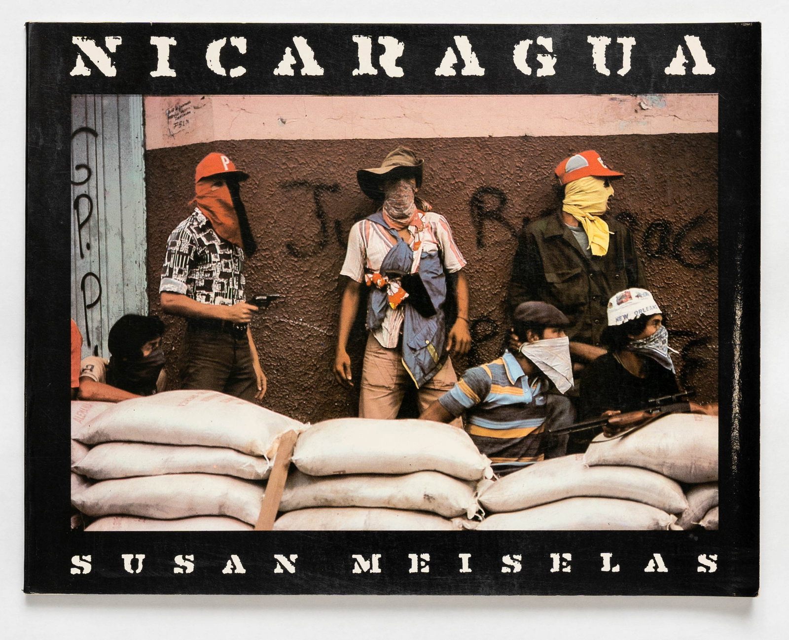 Meiselas, Susan; Nicaragua [SIGNED - 1981 1ST EDITION SOFTCOVER]: SIGNED COPY Pantheon Books, New York 1981. Softcover in pictorial wraps. First Edition, First Printing. Unpaginated with 71 color illustrations. Warmly SIGNED/INSCRIBED and dated by Susan Meiselas on 