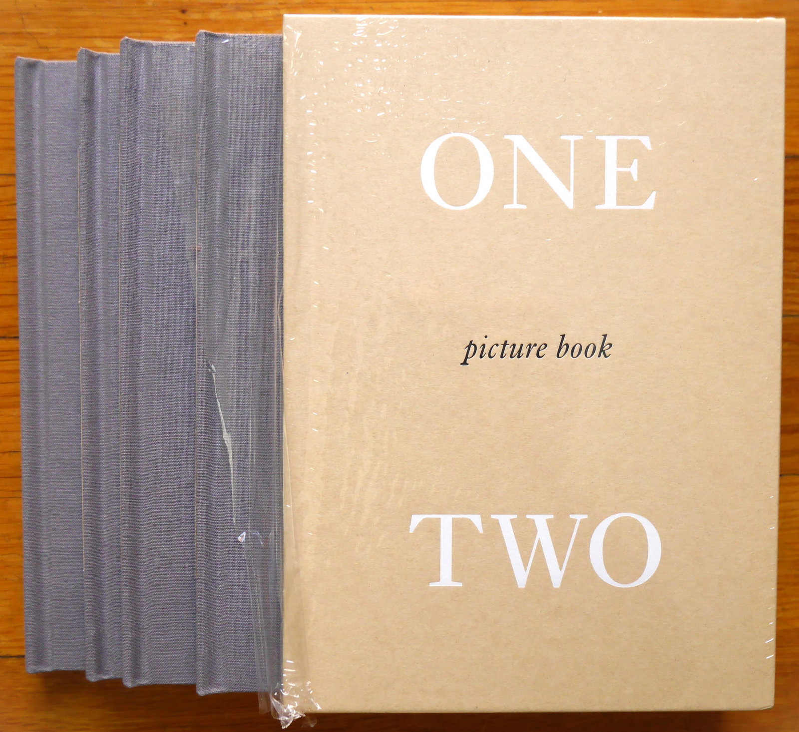 Callis, Jo Ann; Steinmetz, Mark; Nazraeli One Picture Book Two Series Set #8 [4 SIGNED PRINTS]: SIGNED - Nazraeli Press, 2022. 4 Hardcover Volumes in Slipcase (and plain white shipping box). First Edition & First Printing. #29: Pablo Ortiz Monasterio, Peyote; #30: Jo Ann Callis, Black Sun; #31: 
