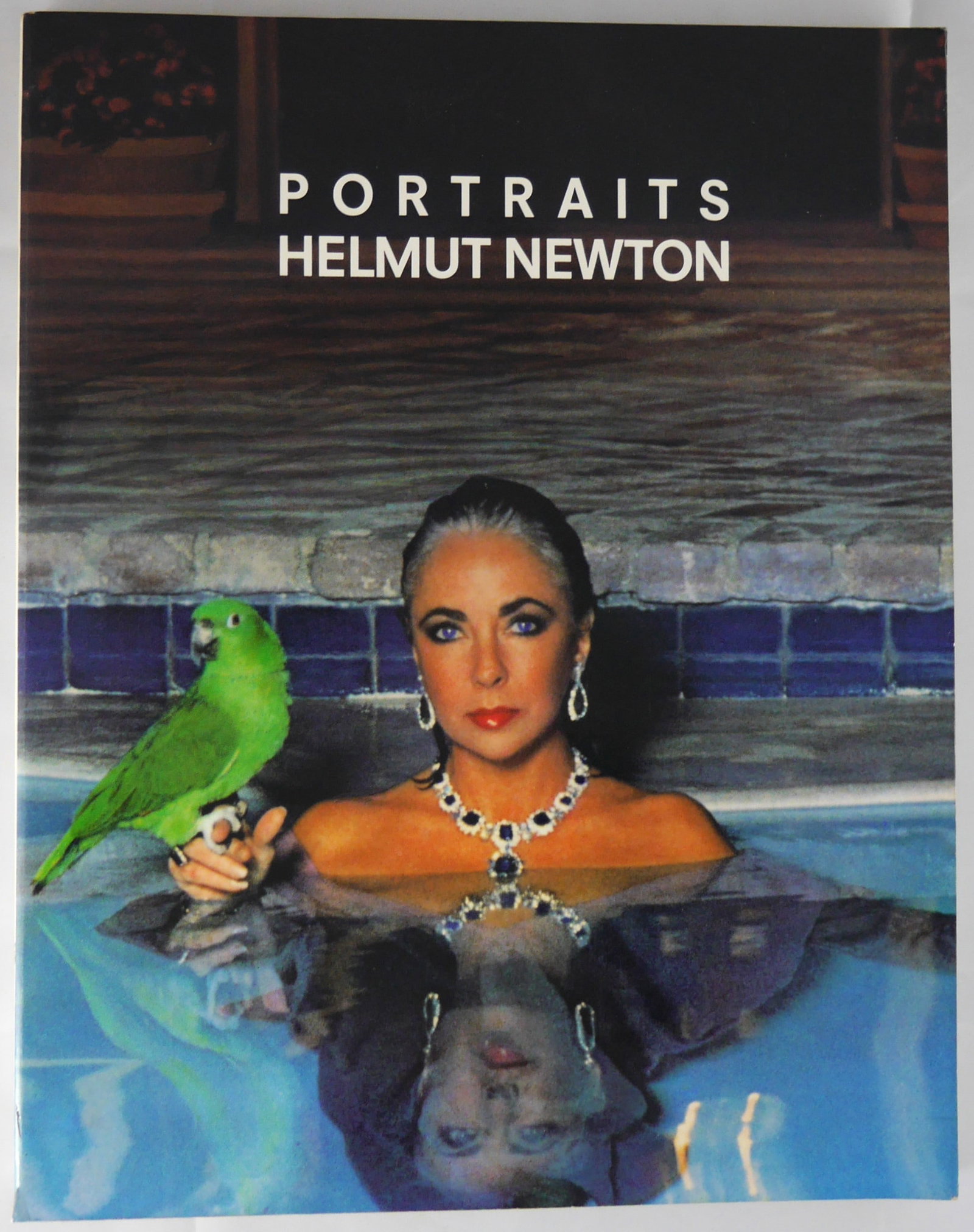 Newton, Helmut; Portraits [SIGNED TO LITERARY AGENT ED VICTOR -1987 1ST ED]: Pantheon, 1987. Softcover in pictorial wrappers. First Edition, First Printing. 247 pages with 191 photographic images in color and black and white by Helmut Newton. 21 page introduction by Carol Squi