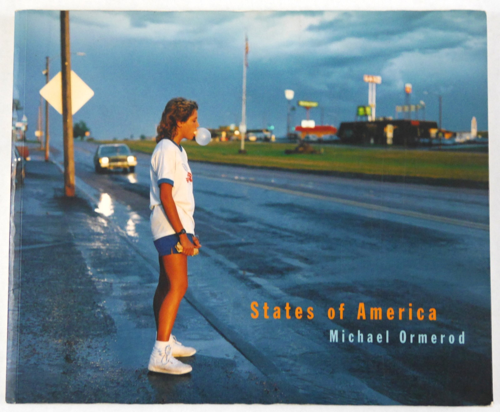 Ormerod, Michael; States of America [RARE 1993 1ST EDITION]: Cornerhouse, 1993. Softcover in pictorial wrappers. First Edition, First Printing. 11 x 9 inches. 112 pages with numerous black and white and color images throughout. BOOK CONDITION: Near Fine; a soli