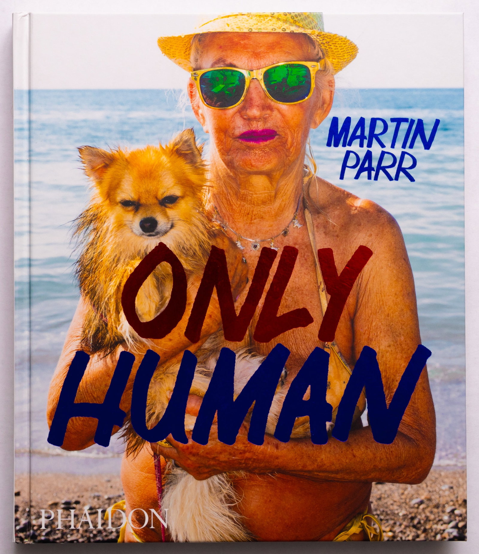 Martin Parr, Only Human [SIGNED 2019 1ST EDITION - NEW]: Phaidon Press, 2019. Hardcover in pictorial boards. First Edition, First Printing. Size: 8x10 inches. 240 pages with numerous color photographic images throughout featuring unpublished work and never-