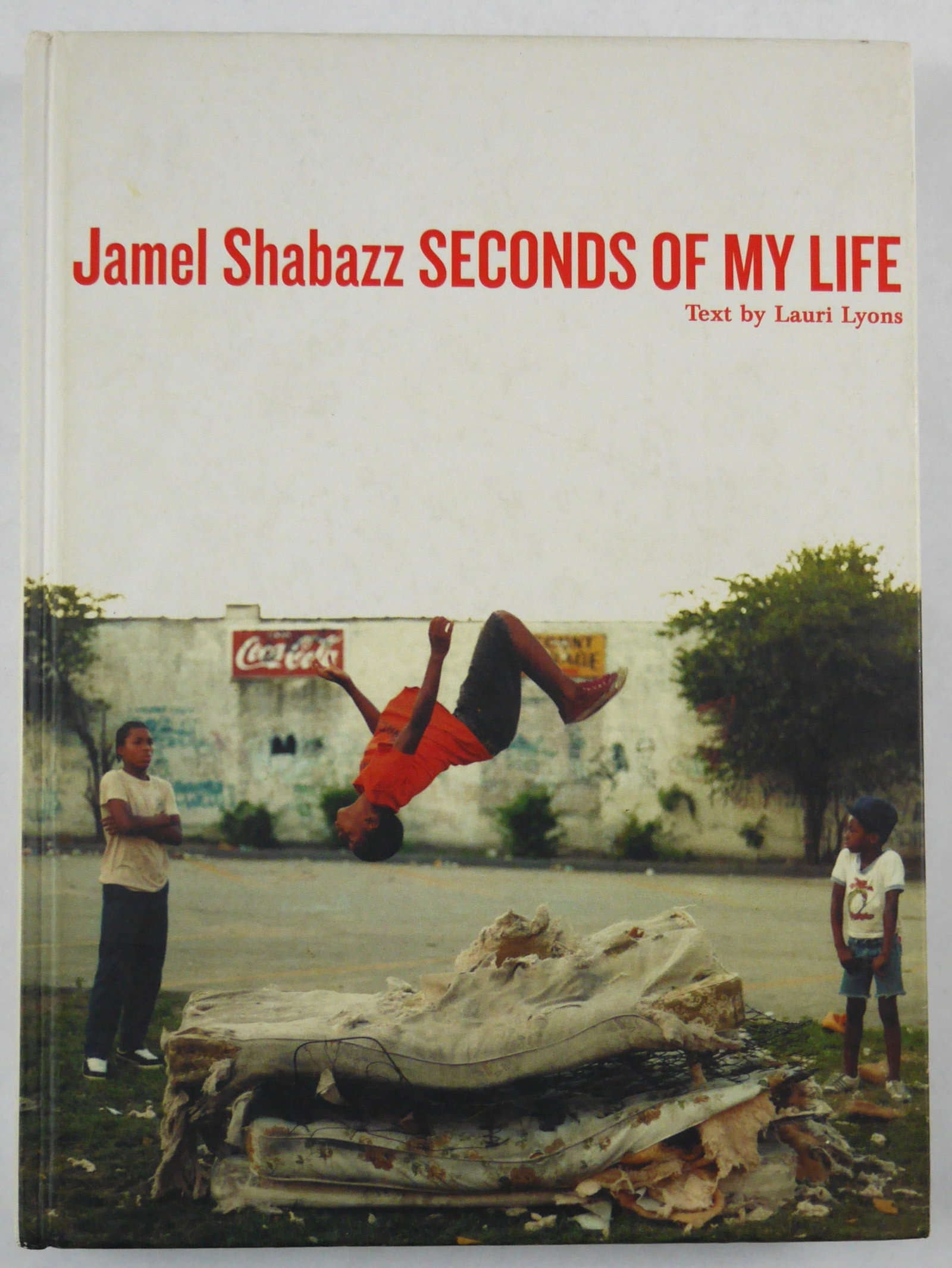 Shabazz, Jamel; Seconds of My Life [2007 1ST EDITION - FINE]: powerHouse Books, 2007. Hardcover in pictorial boards. First Edition, First Printing. 12 x 9 inches. 224 pages with numerous color and black and white photographic images throughout. BOOK CONDITION: F
