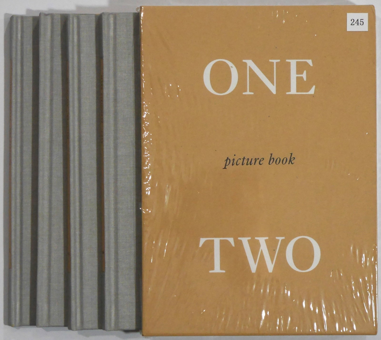 Shibata, Toshio; Steinmetz, Mark; Nazraeli Press One Picture Book Two Series / Set #4 [4 SIGNED LTD: SIGNED - Nazraeli Press, 2019. 4 Hardcover Volumes in Slipcase (and plain white shipping box). First Edition & First Printing. Toshio Shibata: Gas Stations; Manjari Sharma: Darshan; Kenro Izu: Requiem