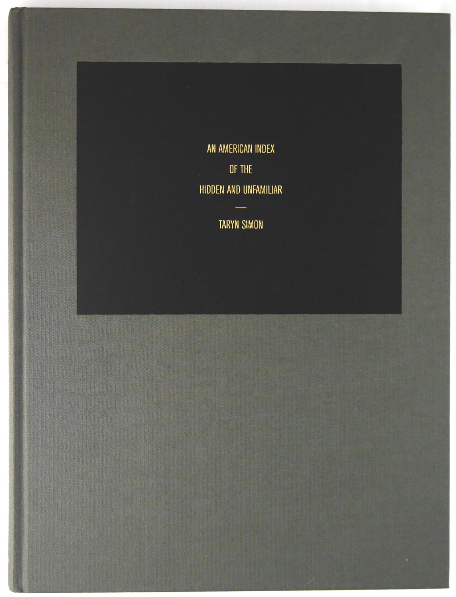 Simon, Taryn; An American Index of the Hidden and Unfamiliar [SIGNED - 2007 1ST ED 1ST PRINT]: SIGNED COPY Germany by Steidl, Göttingen (2007). First edition, first printing. Hardcover. Fine gray cloth-covered boards with title stamped in gold on black debossed title block on cover and spine. 
