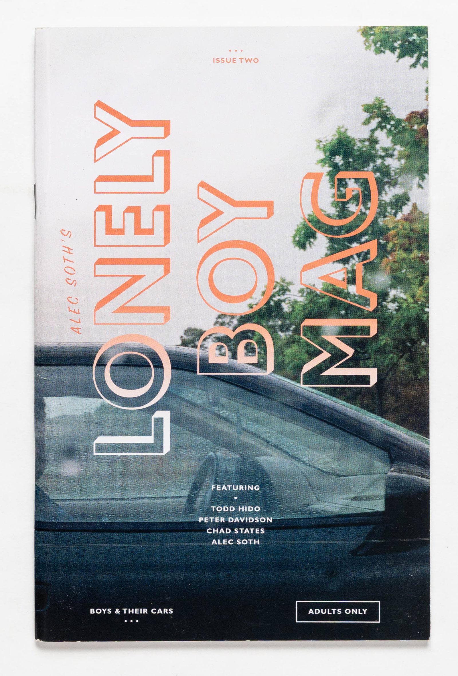 Alec Soth Lonely Boy Mag Issue 2/Two, Boys & Their Cars [SIGNED 2011 1ST ED - FINE]: Alec Soth, 2011. Softcover in pictorial staple-bound wrappers. First Edition, First Printing. 5 x 3 inches. 62 pages with numerous color photographic images throughout presenting Soth's second satiric