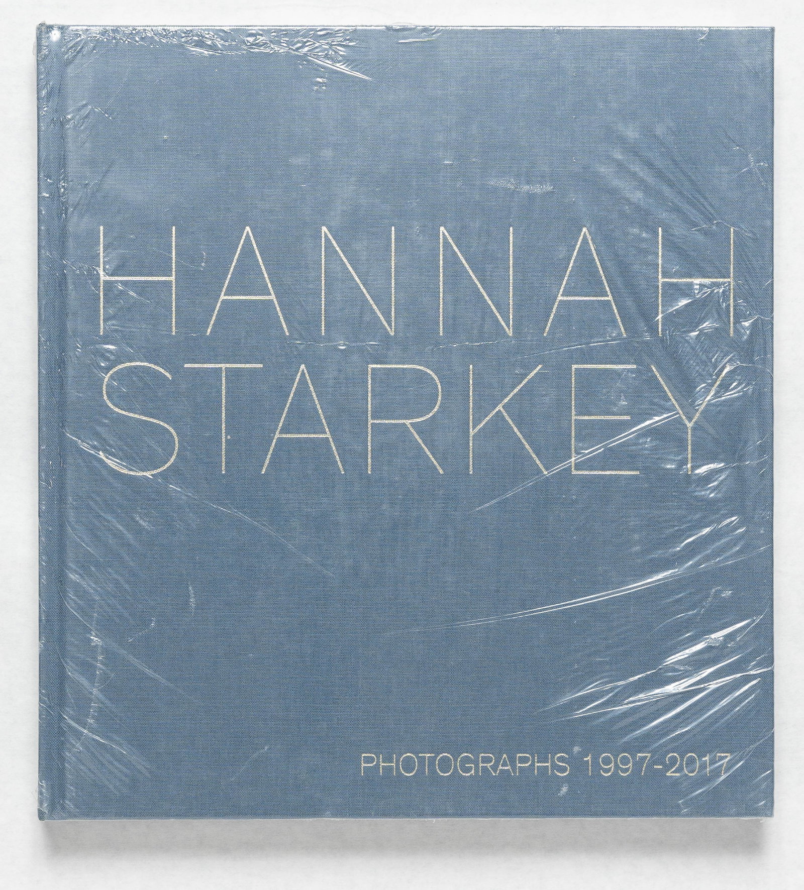 Hannah Starkey: 1997-2017 [2018 1ST EDITION & 1ST PRINTING SEALED IN THE ORIGINAL SHRINKWRAP]: MACK, 2018. Hardcover in blue cloth covers. First Edition, First Printing. 184 pages with numerous photographic images throughout. BOOK CONDITION: Fine; a solid, tight, clean copy still sealed in the 