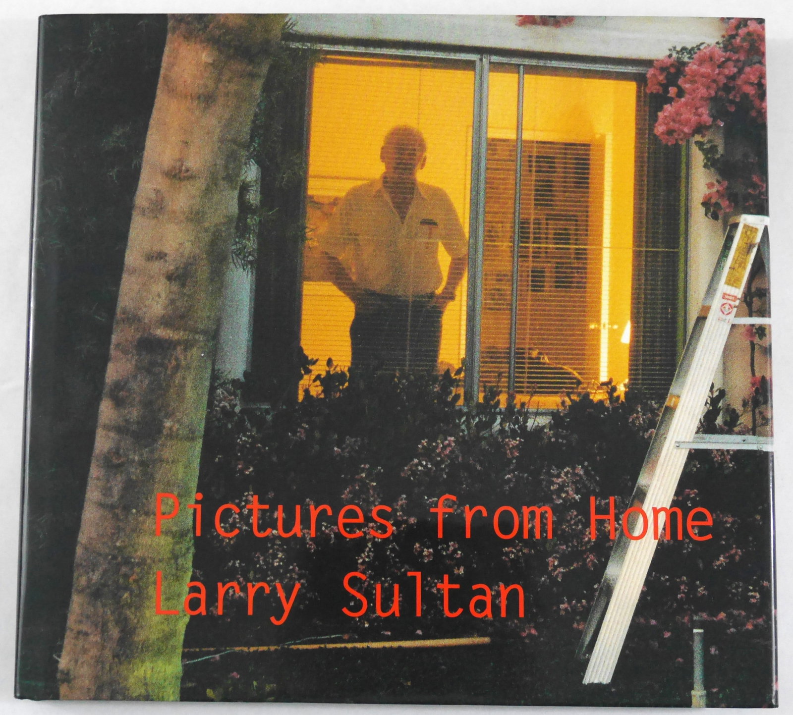 Sultan, Larry; Pictures from Home [1992 1ST EDITION - FINE]: Harry N. Abrams Inc., New York, 1992. Hardcover. First edition, first printing. Fine green cloth-covered boards with title blind-stamped on cover, and stamped in black on spine; with photographically 