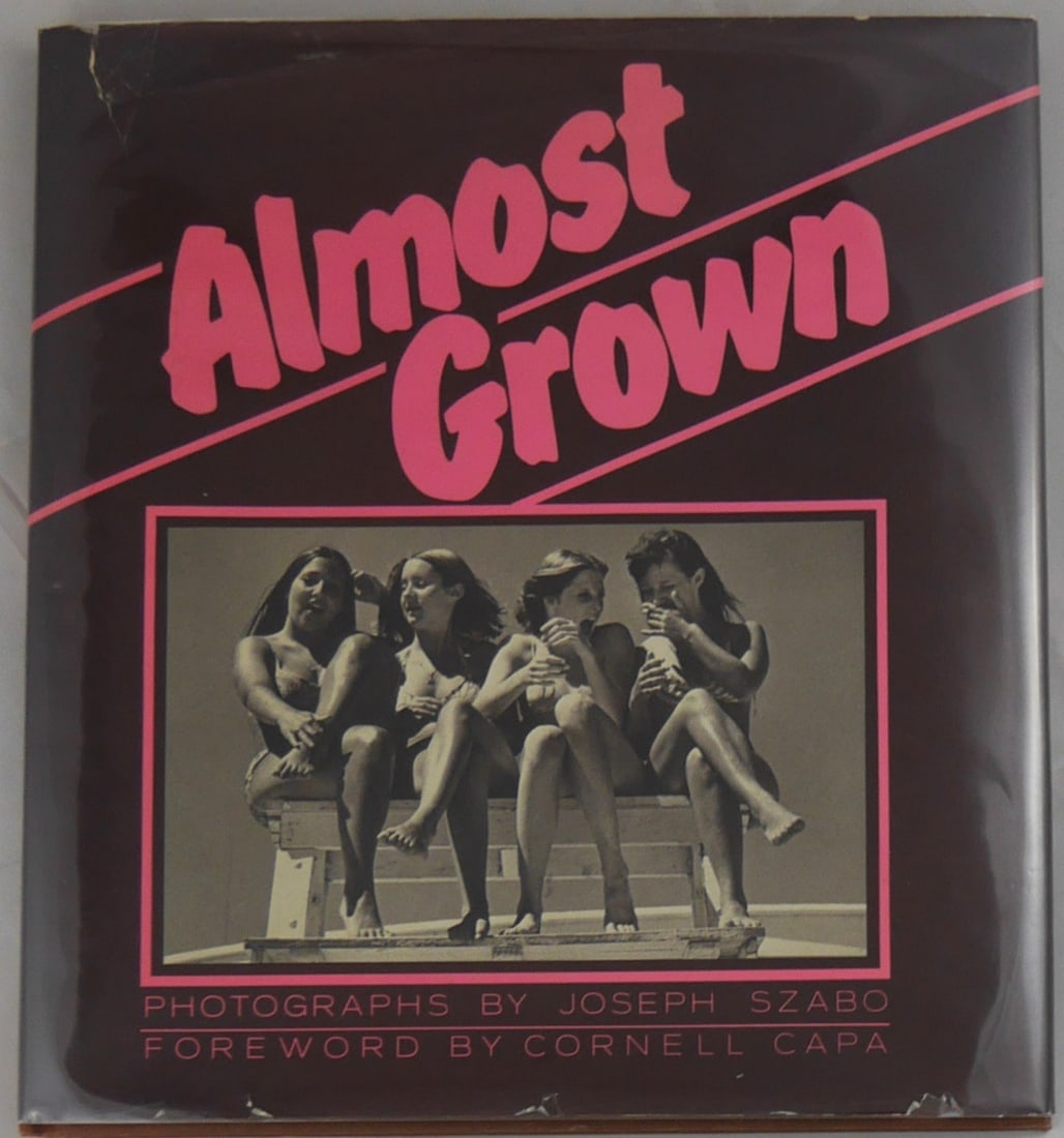 Szabo, Joseph; Almost Grown [1978 1ST EDITION HARDCOVER W/ DUST JACKET.- NICE COPY]: Harmony Books, New York. 1978. Hardcover in pictorial dust jacket. First edition, first printing. 8 1/2 x 9 3/8 inches. 128 pages. 90 black and white photographs. Foreword by Cornell Capa. 25 poems co