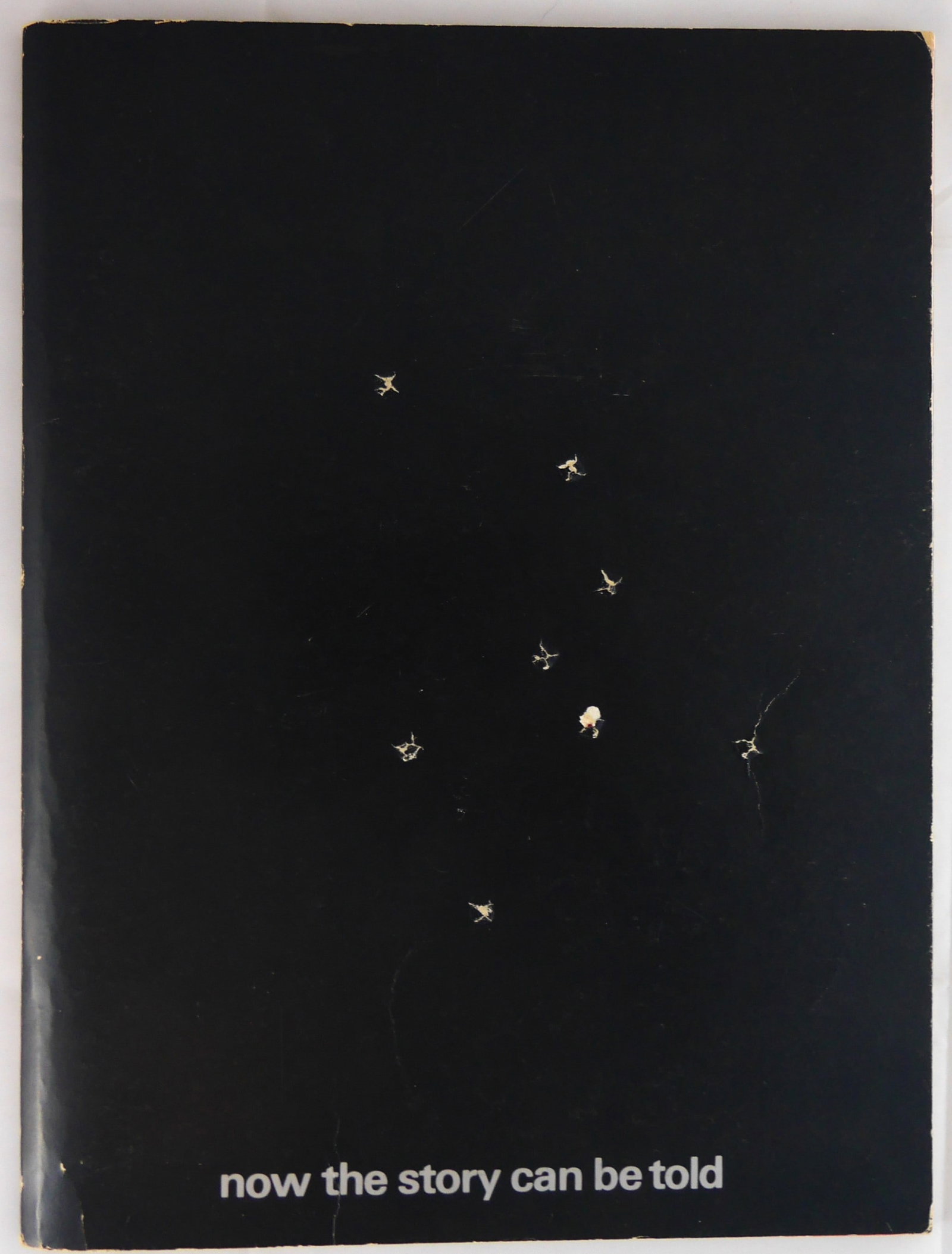 Tal, Eliyahu, ed.; The PLO: Now the Story Can Be Told [RARE 1982 1ST ED]: Jerusalem: Department of Information, 1982. Softcover in black card covers with 8 faux "automatic weapon" bullet holes to front cover (as issued). 4to. 79 pages with numerous illustrations and photogr