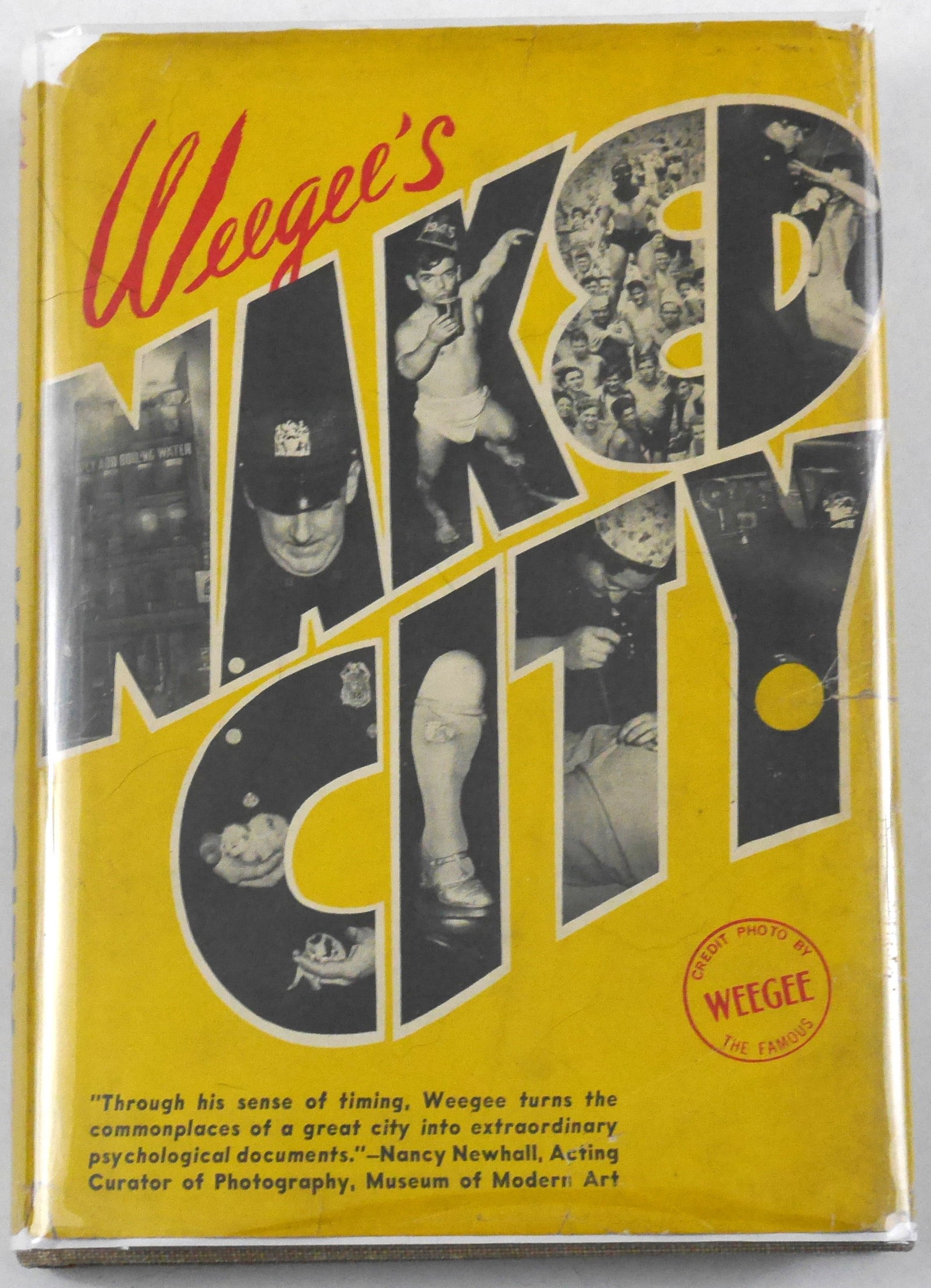 Weegee; Naked City [1945 1ST ED 1ST PRINT HARDCOVER FIRST ISSUE DUST JACKET]: Essential Books 1945. Hardcover in coarse grey cloth with title and author stamped in navy to cover and spine in first issue pictorial dust jacket (NO mention of a second prinitng on the front flap). 